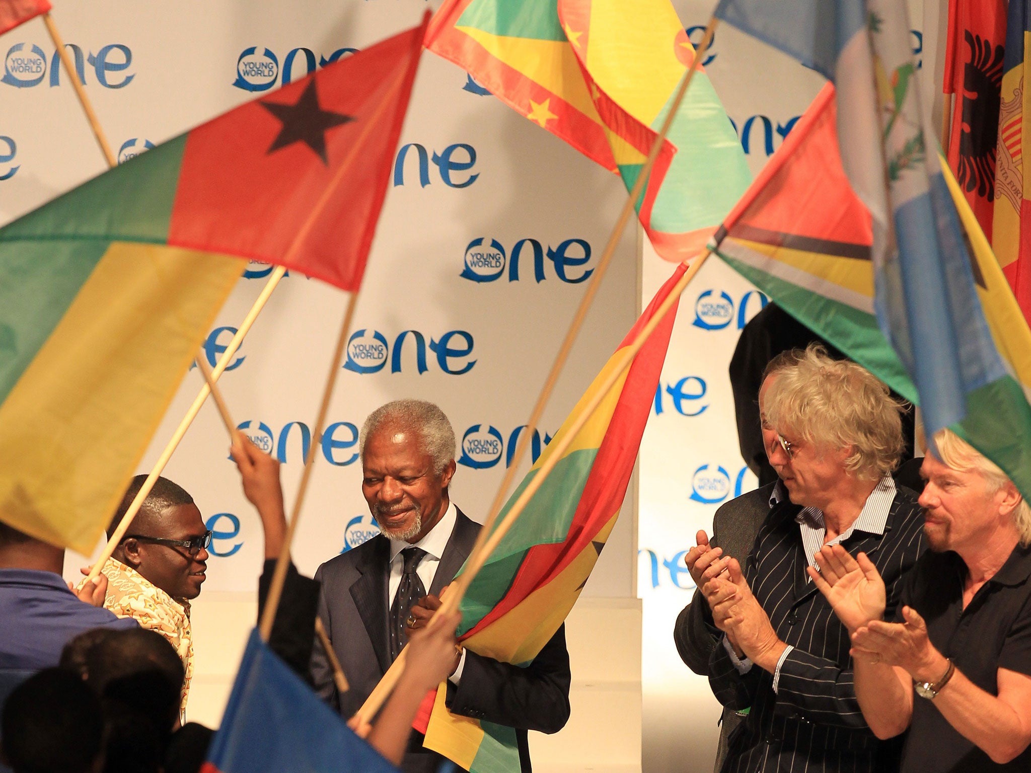 Former United Nations Secretary-General Kofi Anna, Sir Richard Branson, far right, and Irish activist Sir Bob Geldof, second from right, during the opening ceremony for the One Young World summit