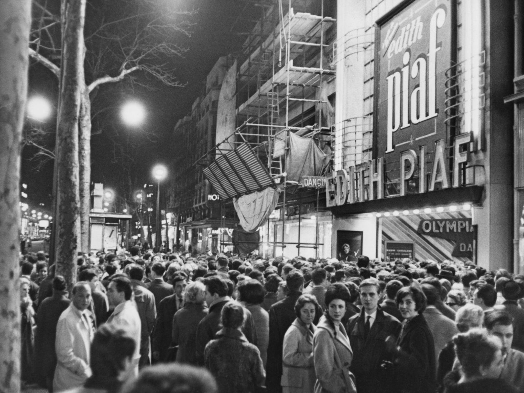 Crowds queue outside the Olympia theatre to see Piaf