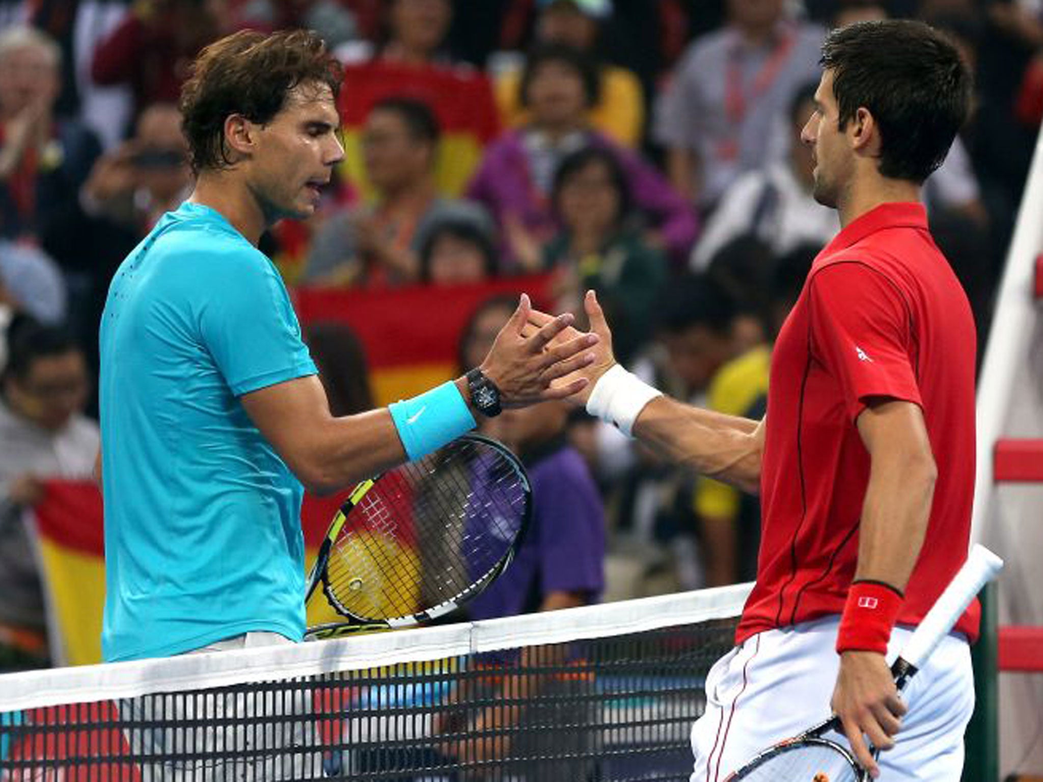 Rafael Nadal congratulates Novak Djokovic on his China Open victory