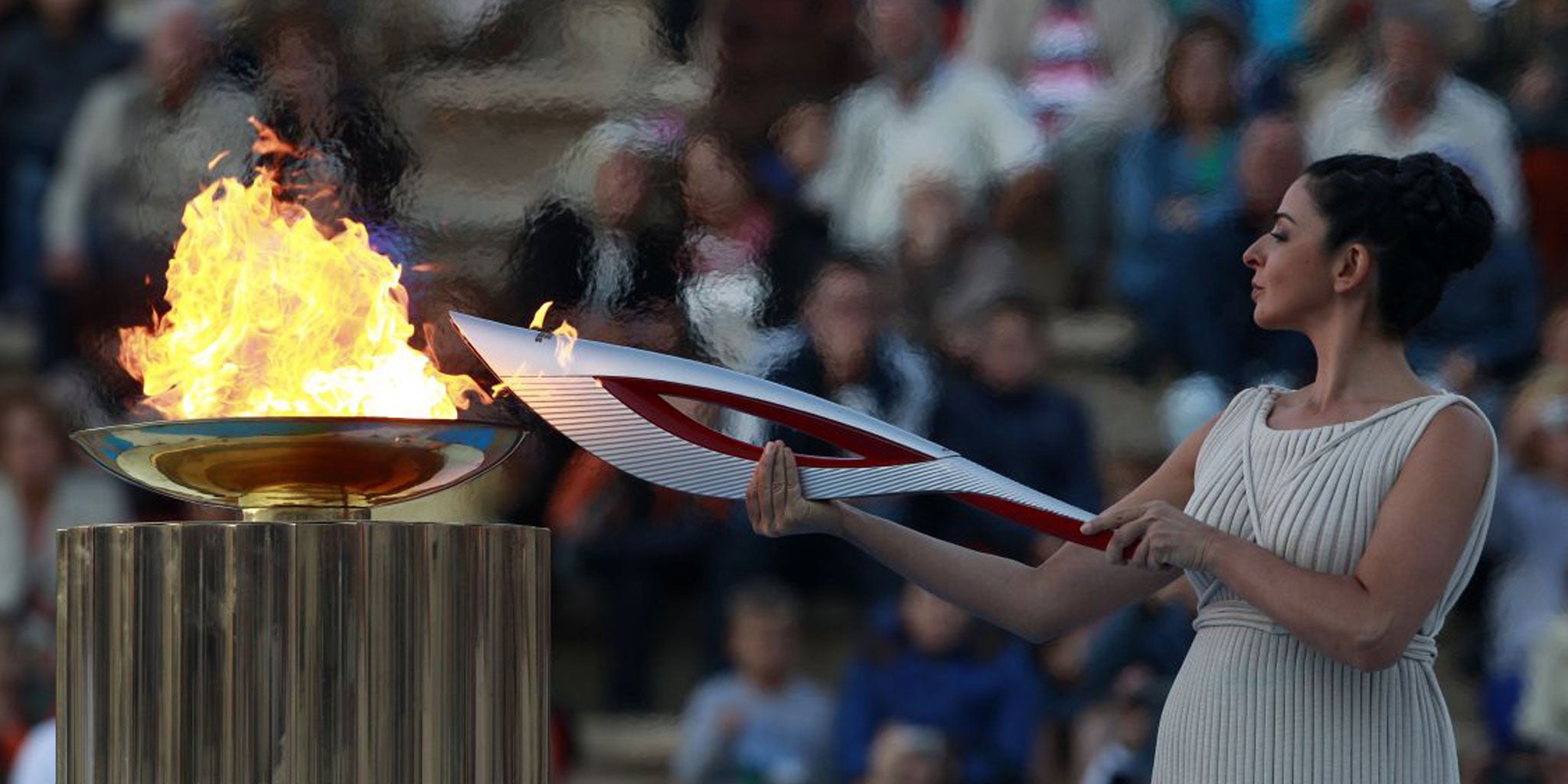 The Olympic flame is lit in Athens before its transfer to the Sochi Games, which has been troubled by claims of corruption and workers’ rights violations