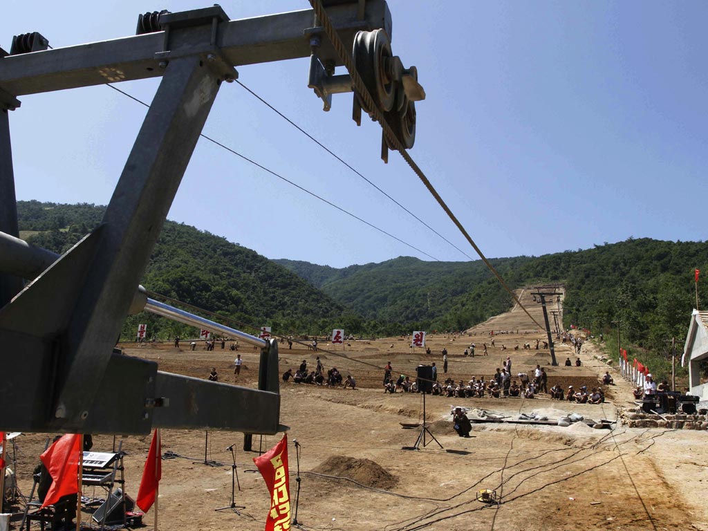 North Korean soldiers work on a building project to construct a ski resort at North Korea's Masik Pass. North Korean authorities have been encouraging a broader interest in sports in the country, both at the elite and recreational levels, as a means of en