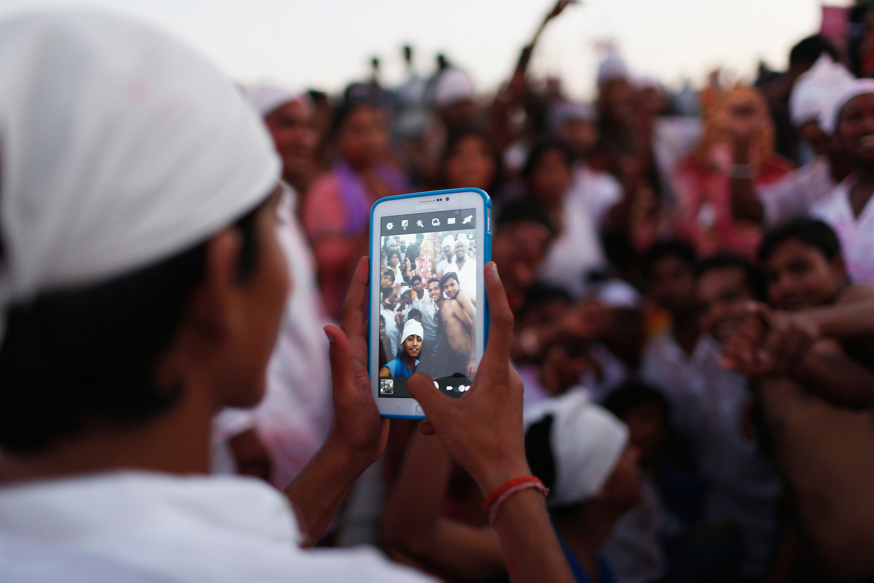 Mobile subscriptions have been boosted by the sales of low-cost devices in Asia and India