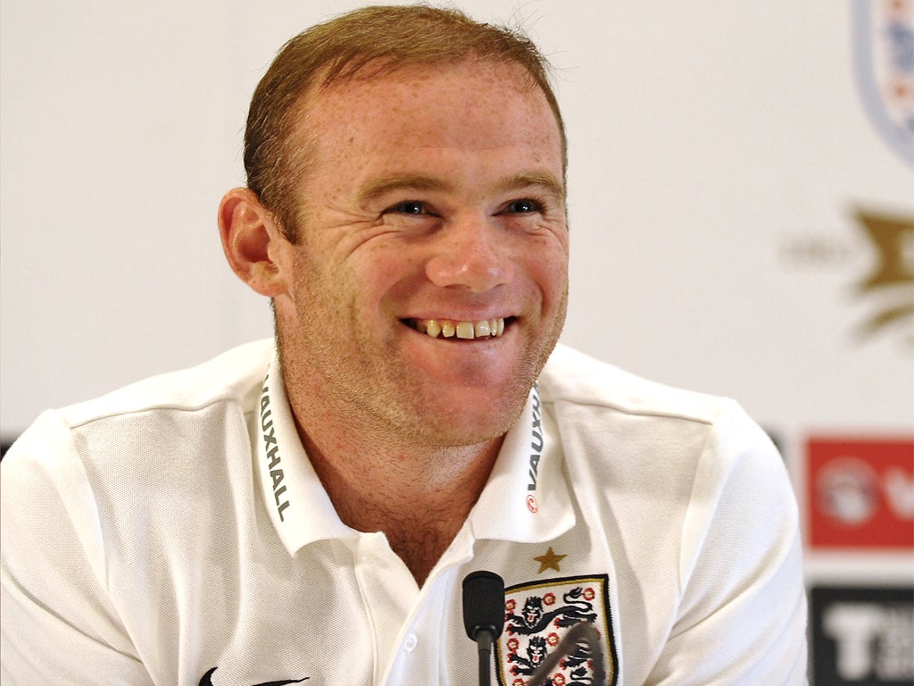 Wayne Rooney speaks to the media at St Georges Park