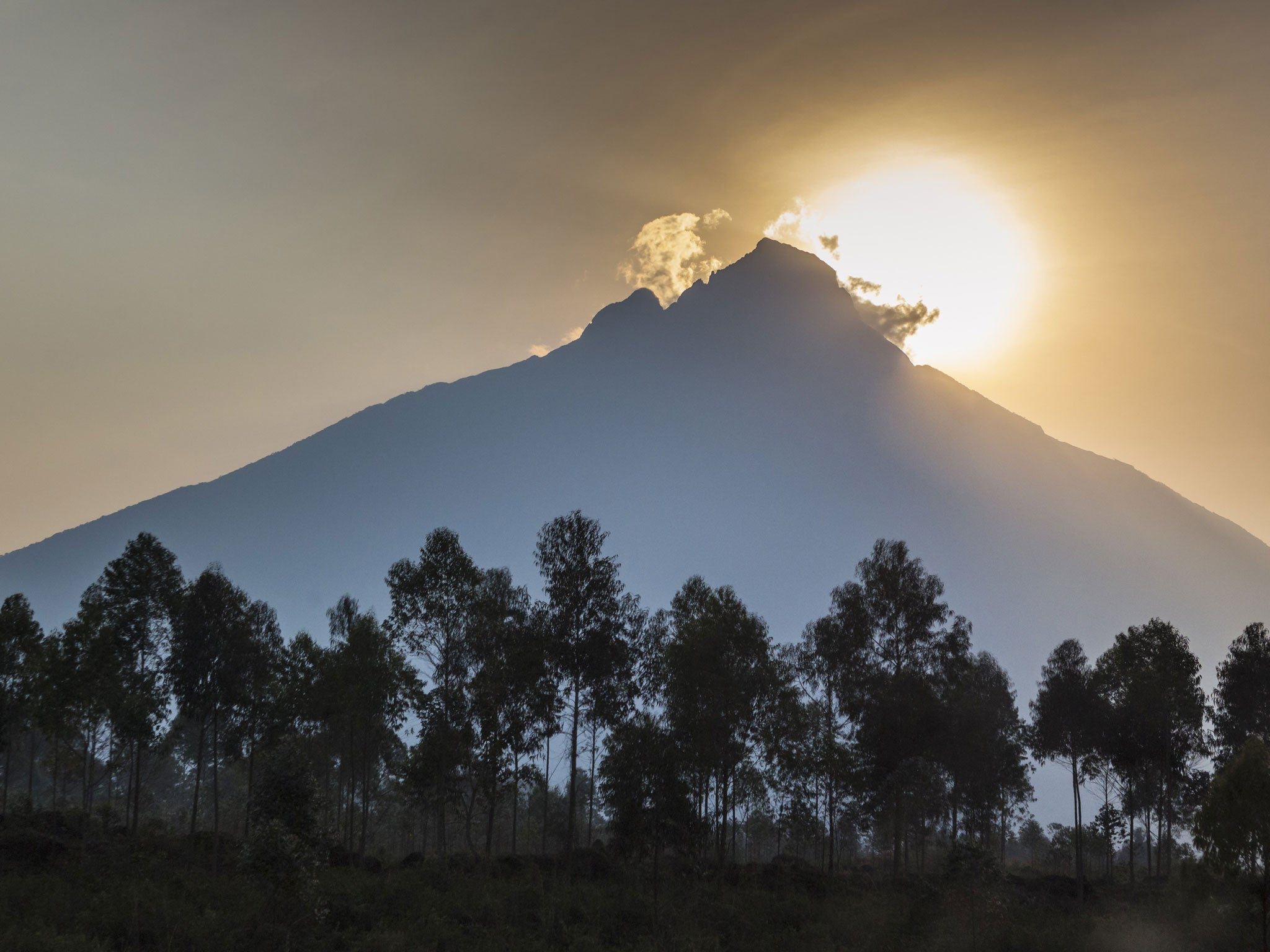 Sunrise behind Mount Mikeno