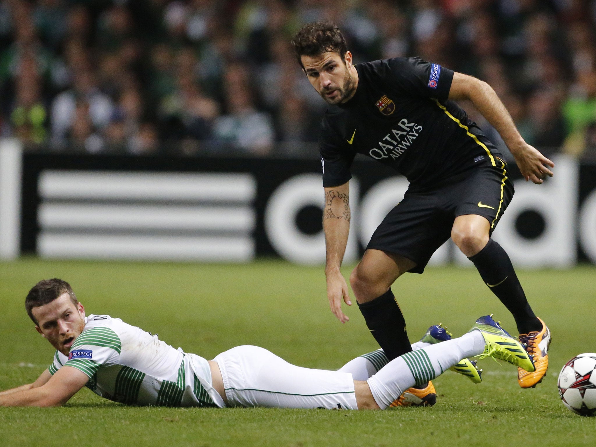 Cesc Fabregas (right) said Barcelona were 'in a mess' last season