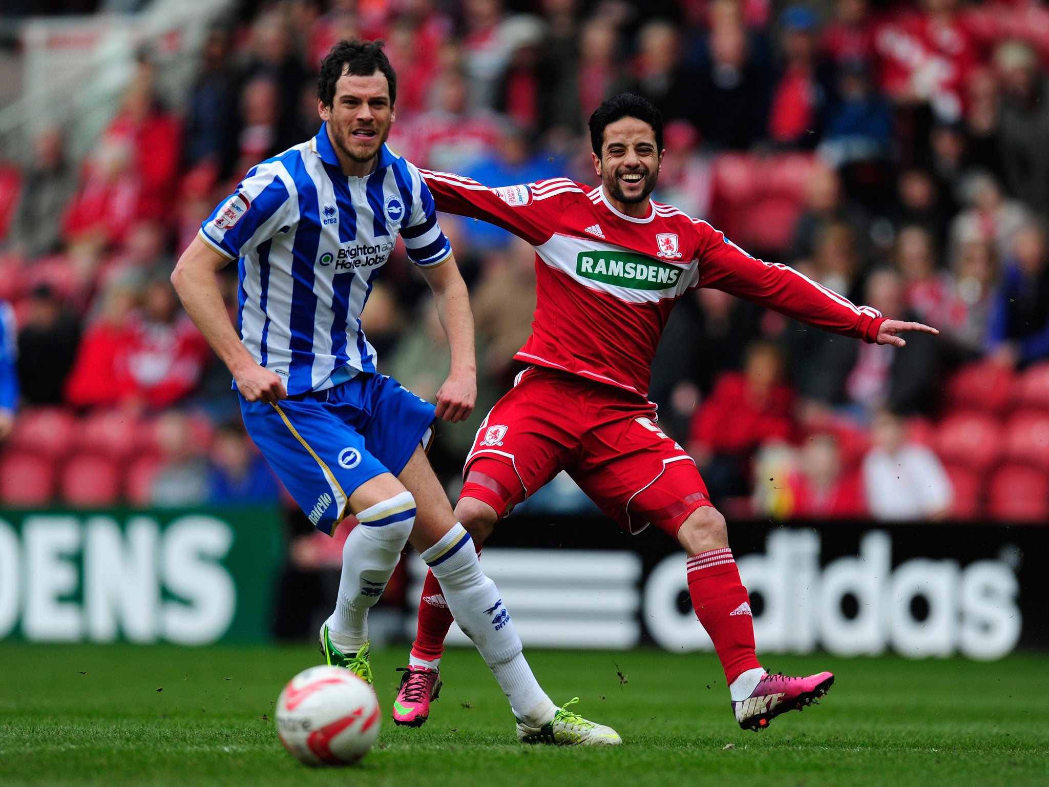 Gordon Greer (left) has raised his hopes of a cap with Brighton