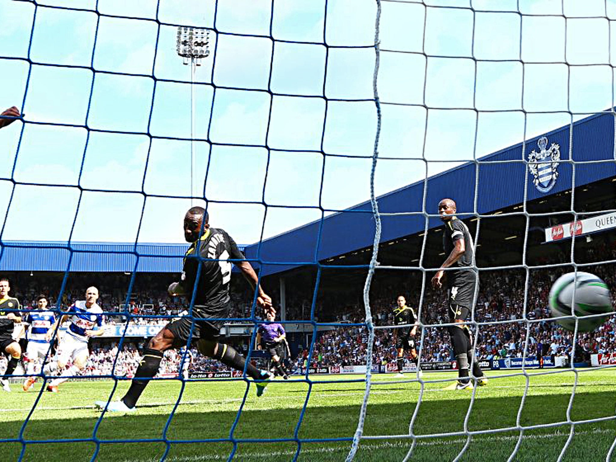 Sheffield Wednesday's Kamil Zayatte looks on as the ball passes him into the empty net