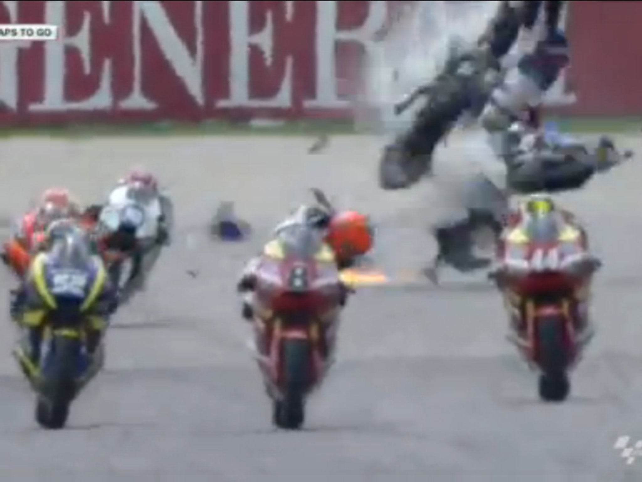 Axel Pons' bike is hit by Fadli Immammuddin, launching him high into the air during the Moto2 Malaysian Grand Prix