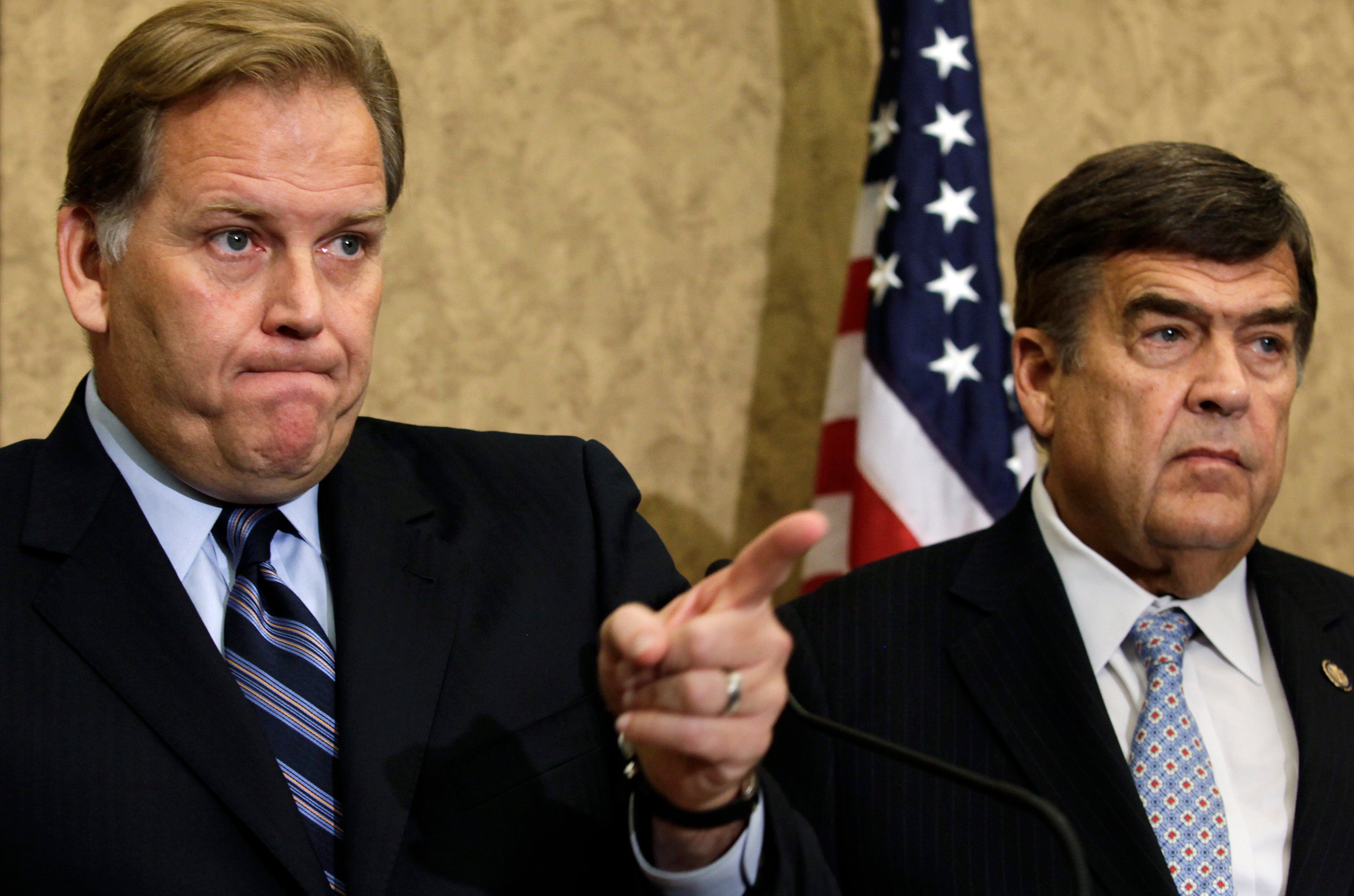 In the US, a House Intelligence Committee report led by Chairman Mike Rogers (L) and Rep. Dutch Ruppersberger (R) dubbed Huawei a "national security threat".