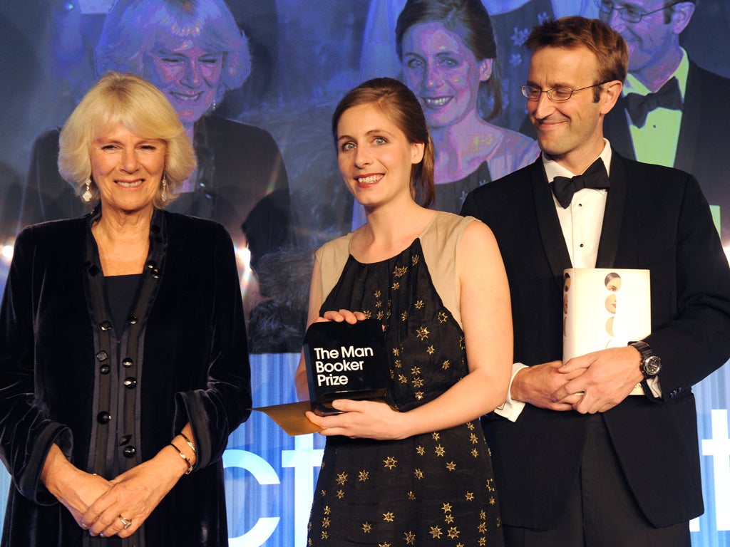 Eleanor Catton, author of 'The Luminaries' poses for photographs with Camilla, Duchess of Cornwall