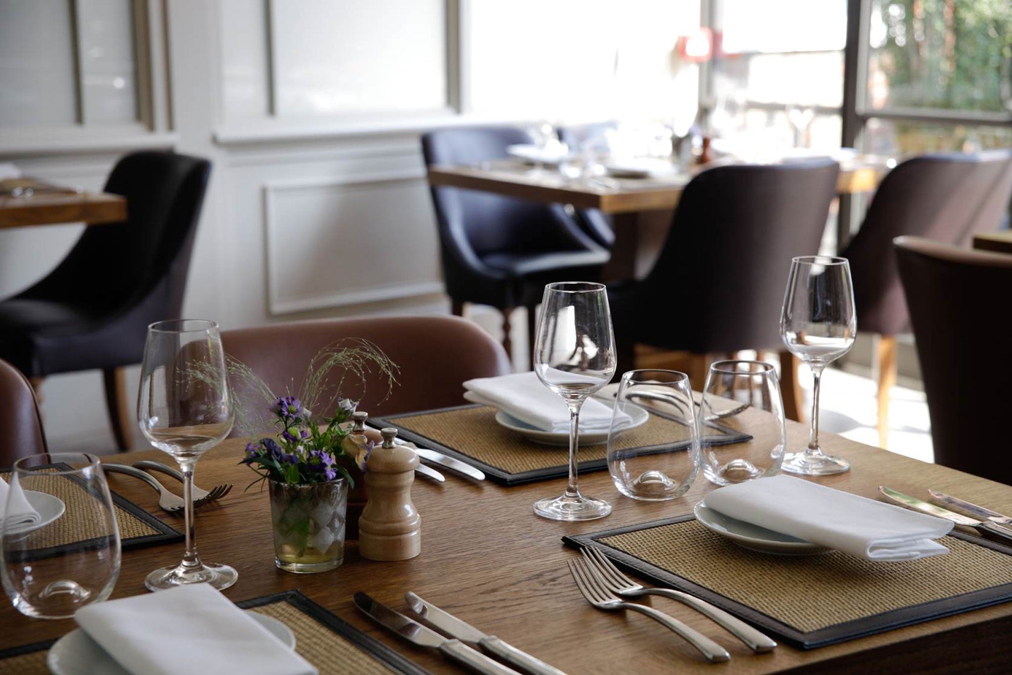 The handsome dining area keeps some cosy-pub virtues