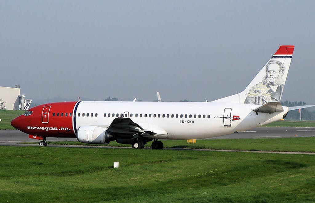 A Norwegian Air Shuttle Boeing 737-300 (LN-KKO) taxis to the runway at Birmingham International Airport, England