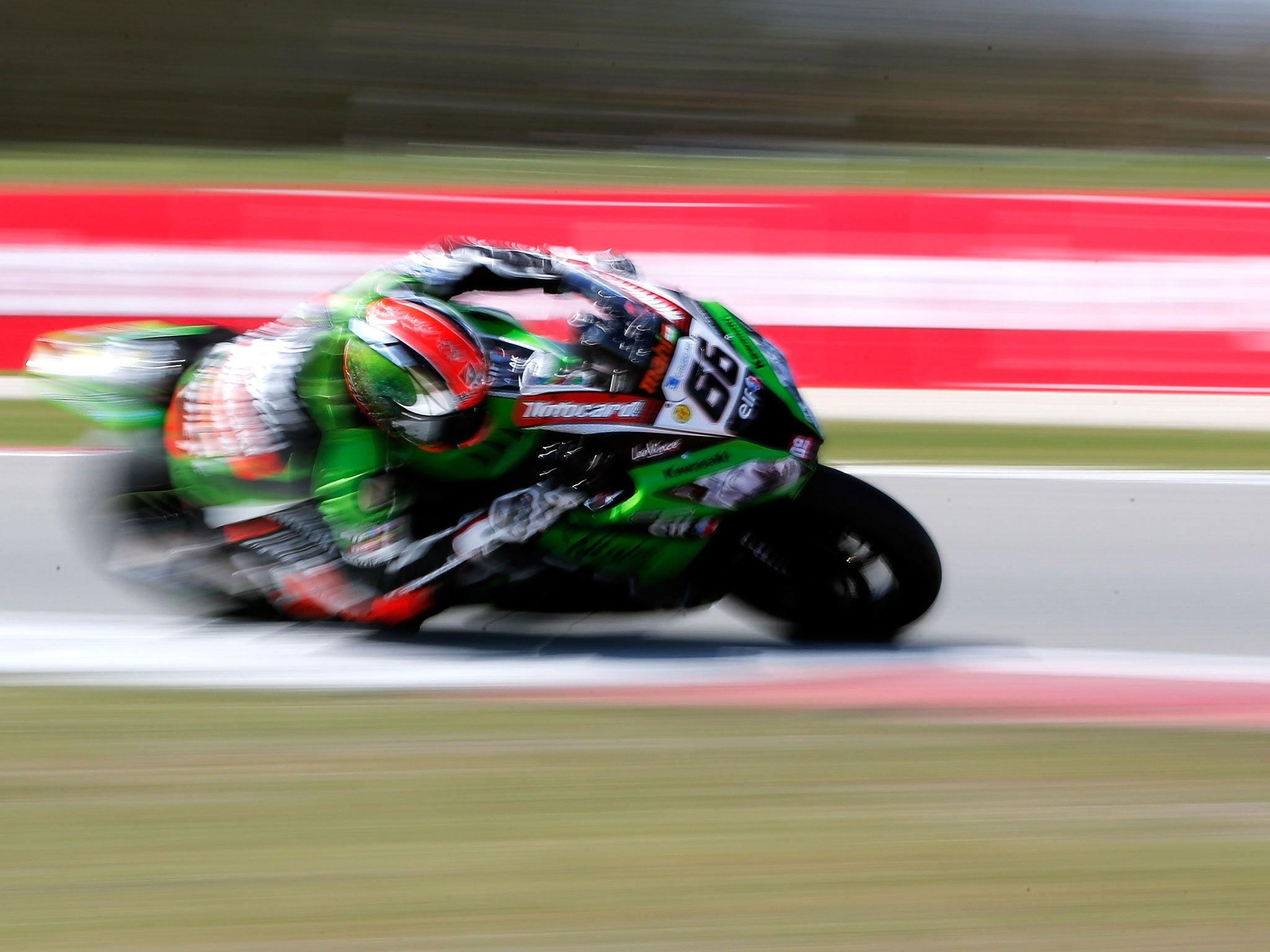 Britain's Tom Sykes leans into a bend on his Kawasaki ZX-10R