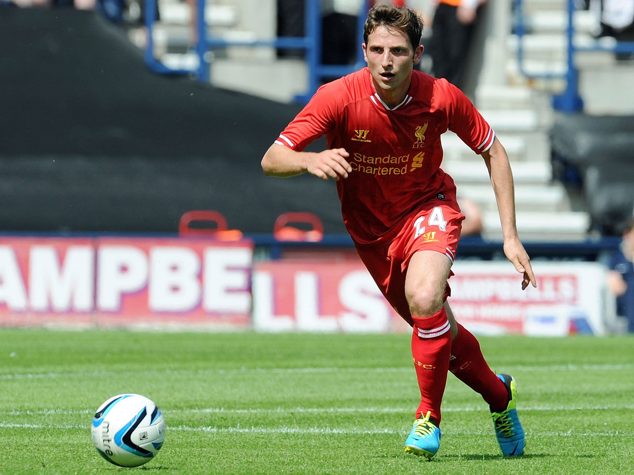 Joe Allen makes a pass for Liverpool