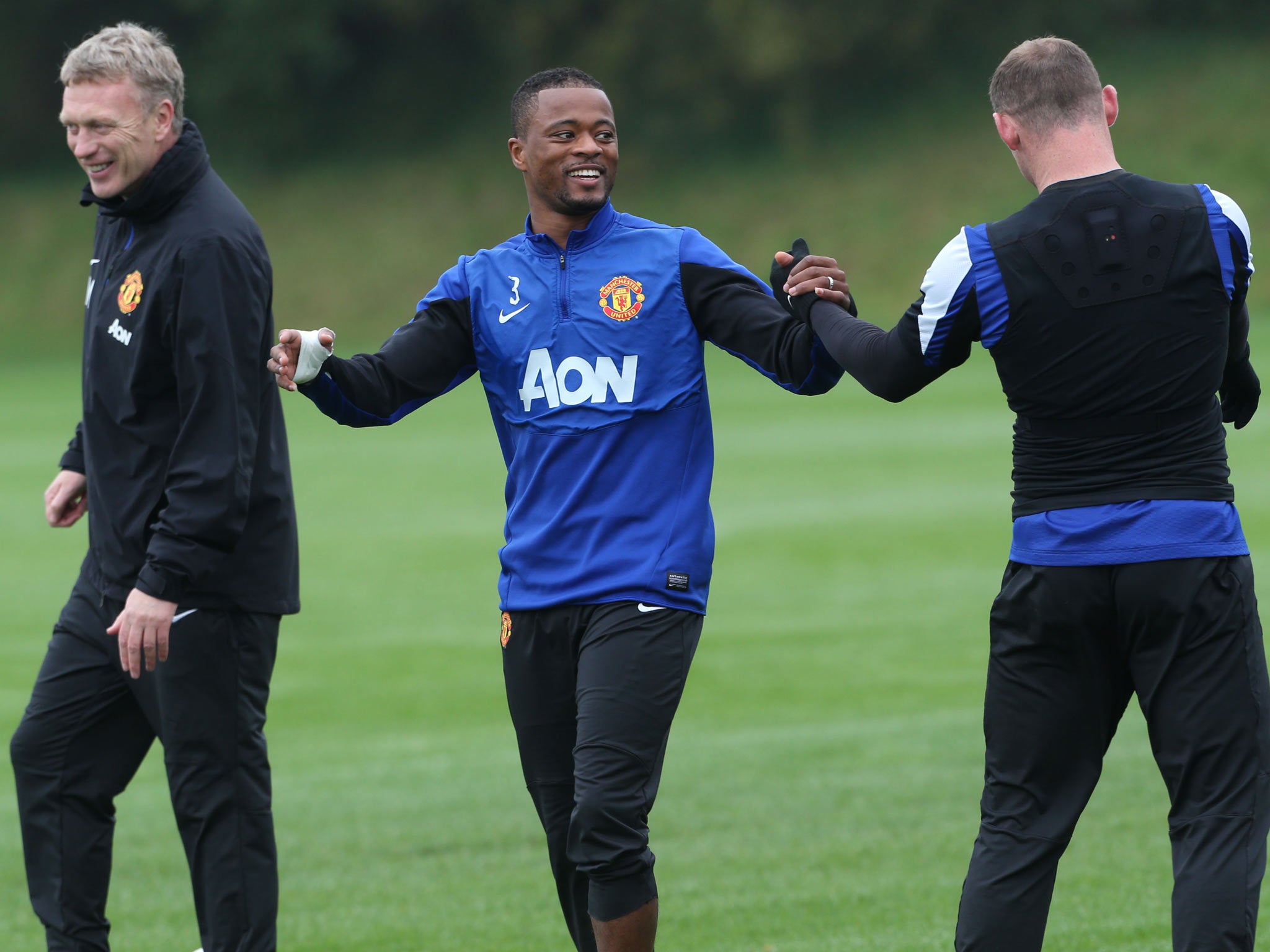 David Moyes, Patrice Evra and Wayne Rooney train together
