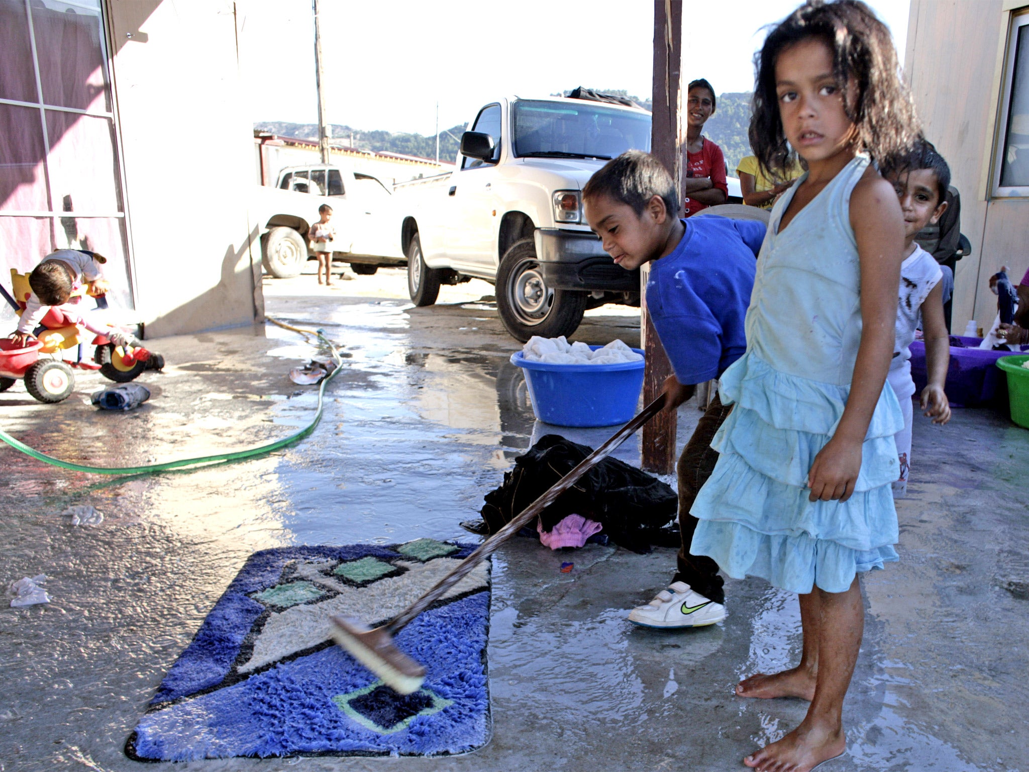 A child looks on in the camp where ‘Maria’ was found