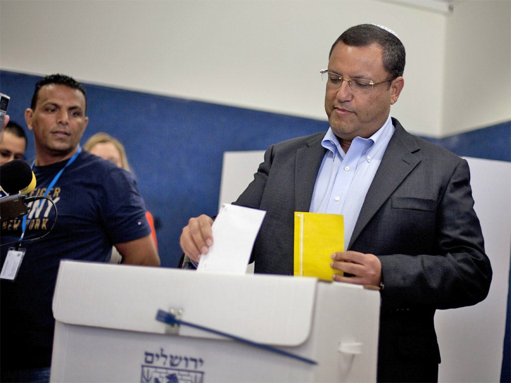 Mayoral candidate Moshe Lion casts his vote (Getty)