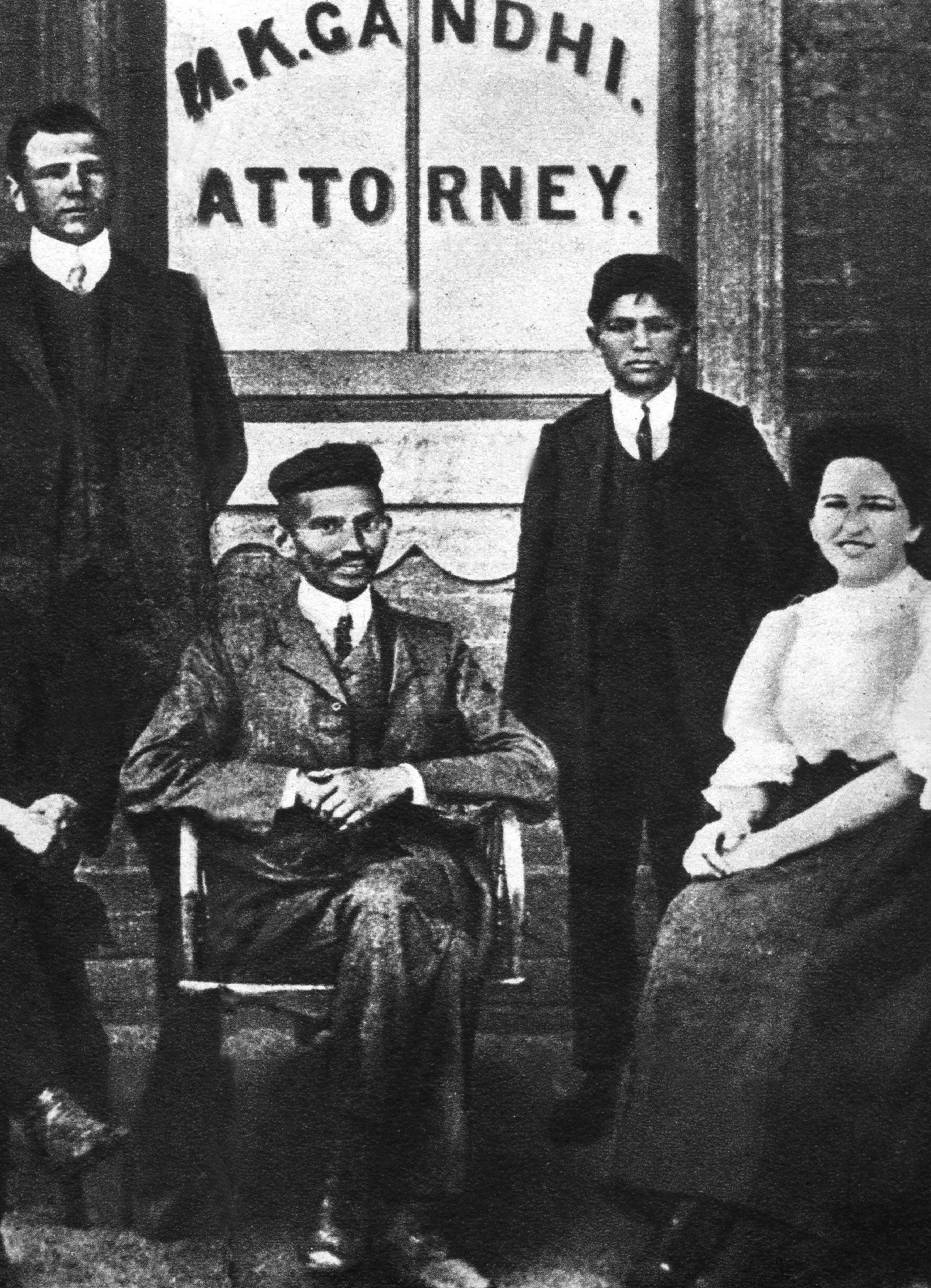 Henry Polak, left, and Gandhi, centre, pose at the attorney's office in South Africa