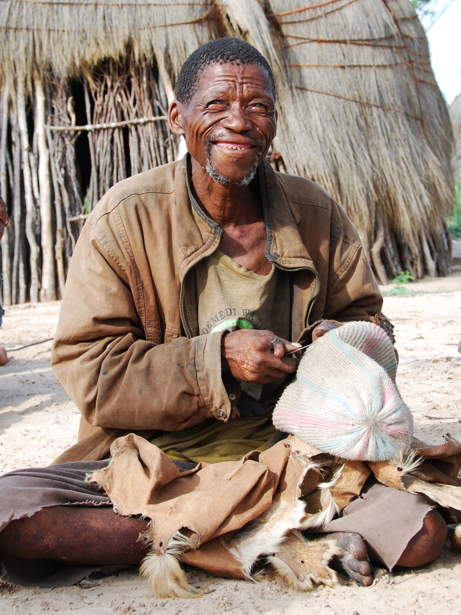 The Bushmen can skilfully transform buck skins into clothes, bags, and other useful items. (Photo provided by Survival International)