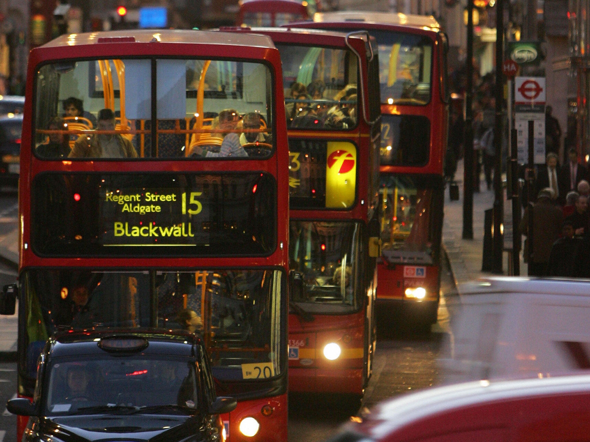 Buses do sometimes come in threes (AFP/Getty)