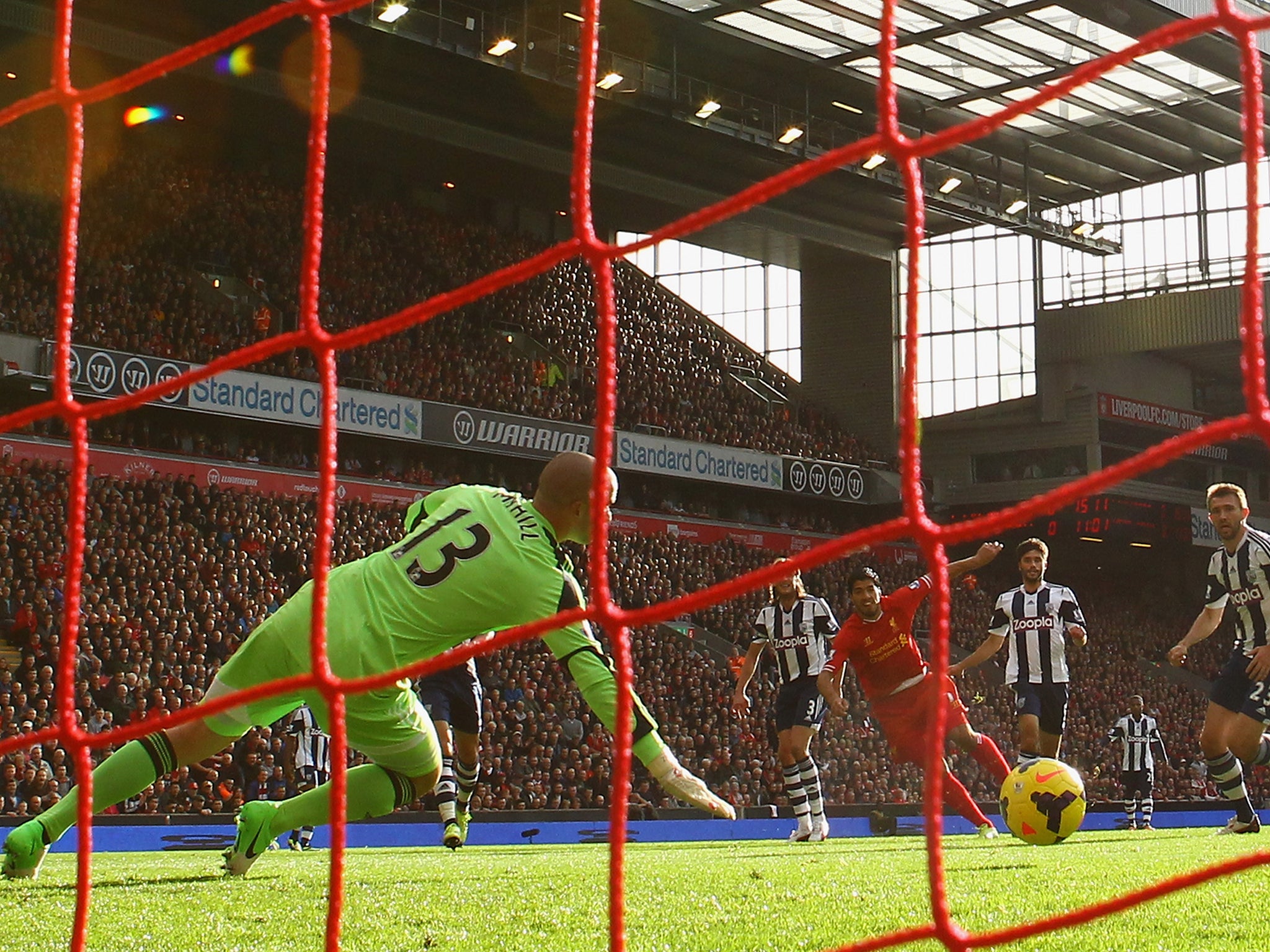 Luis Suarez fires past Boaz Myhill to give Liverpool the lead.