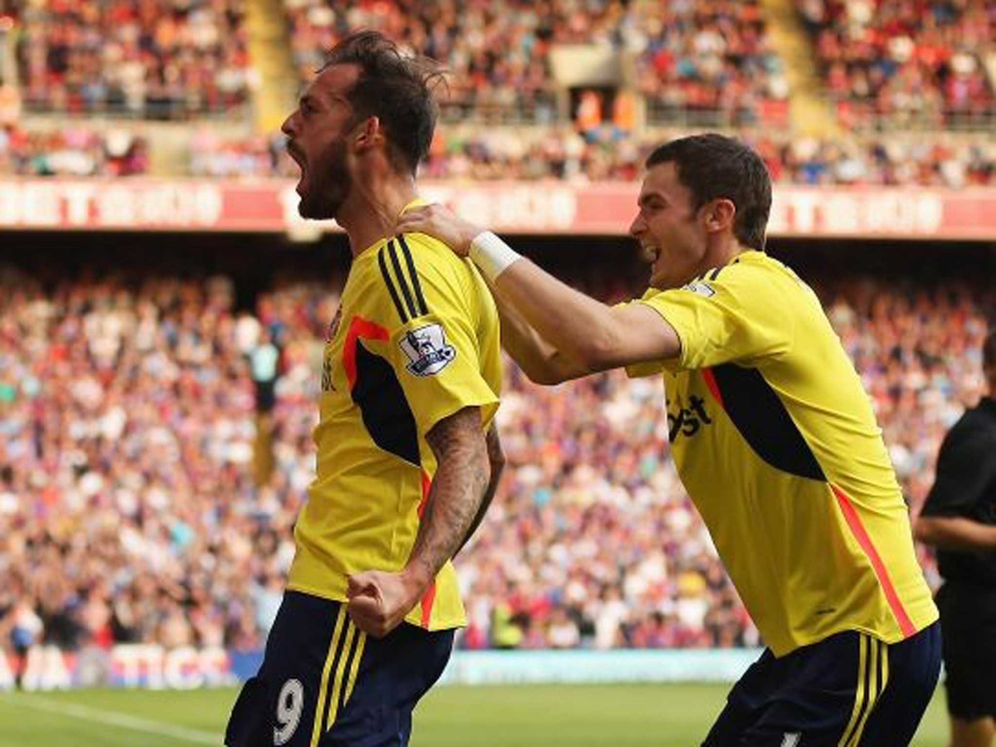 Roaring to go : ‘As players we know we’re good enough to stay up,’ says Steven Fletcher (left), whose goals will be needed to secure survival