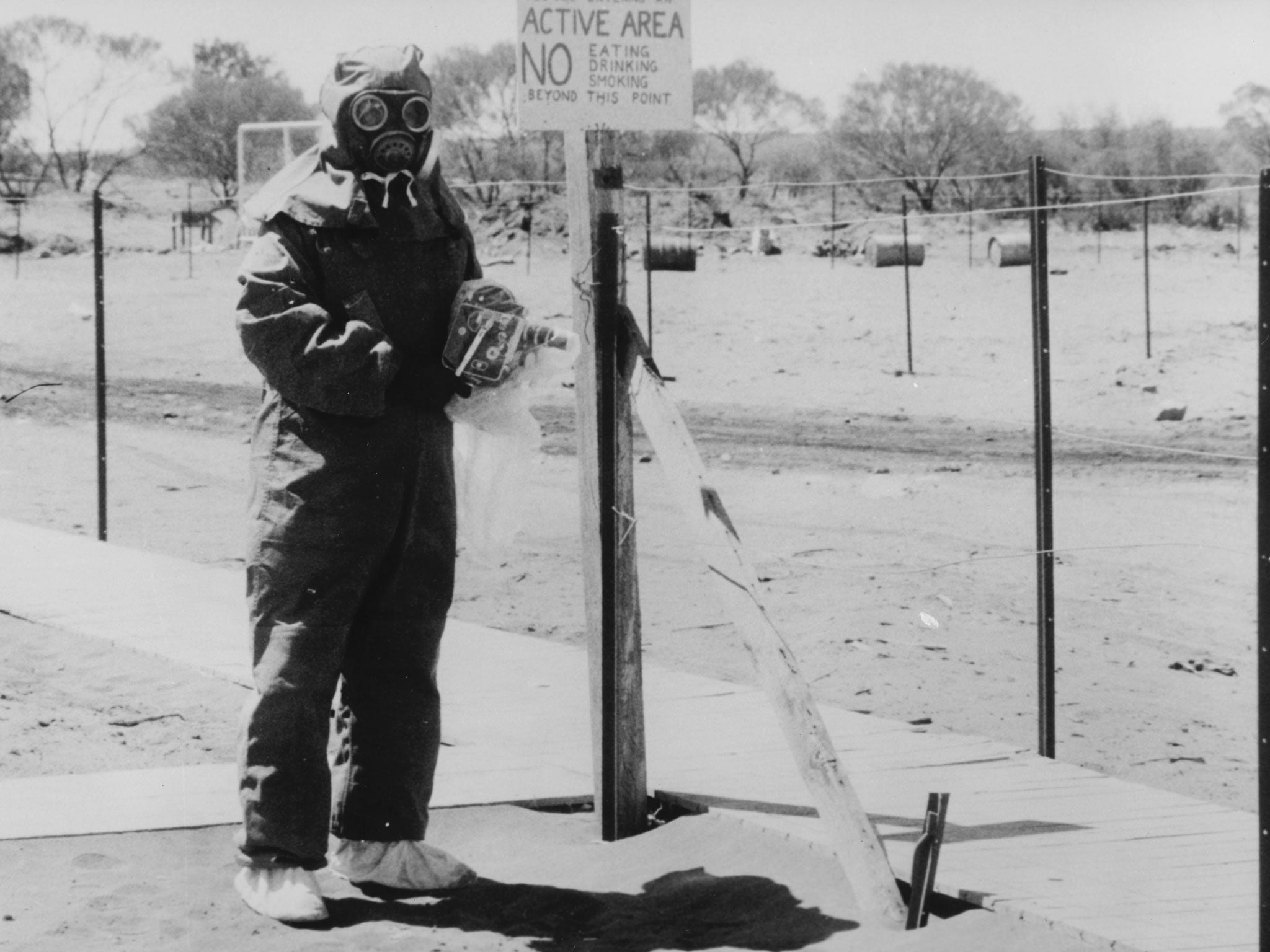A worker at the nuclear test site at Maralinga wears protective gear in 1950