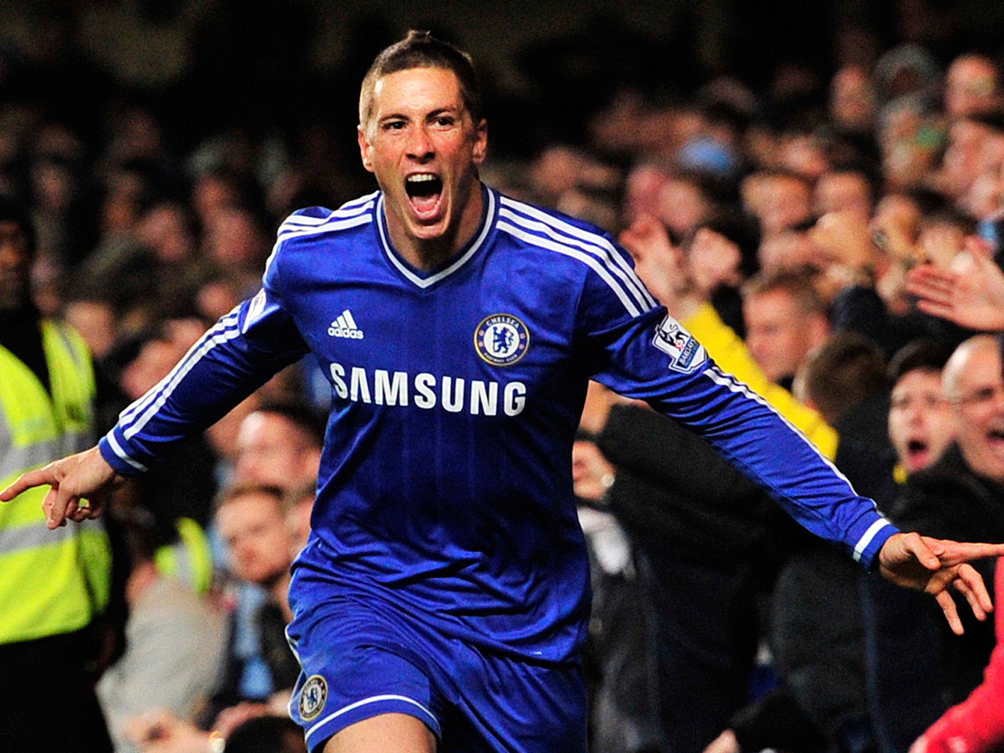 Fernando Torres celebrates scoring the winning goal for Chelsea against Manchester City