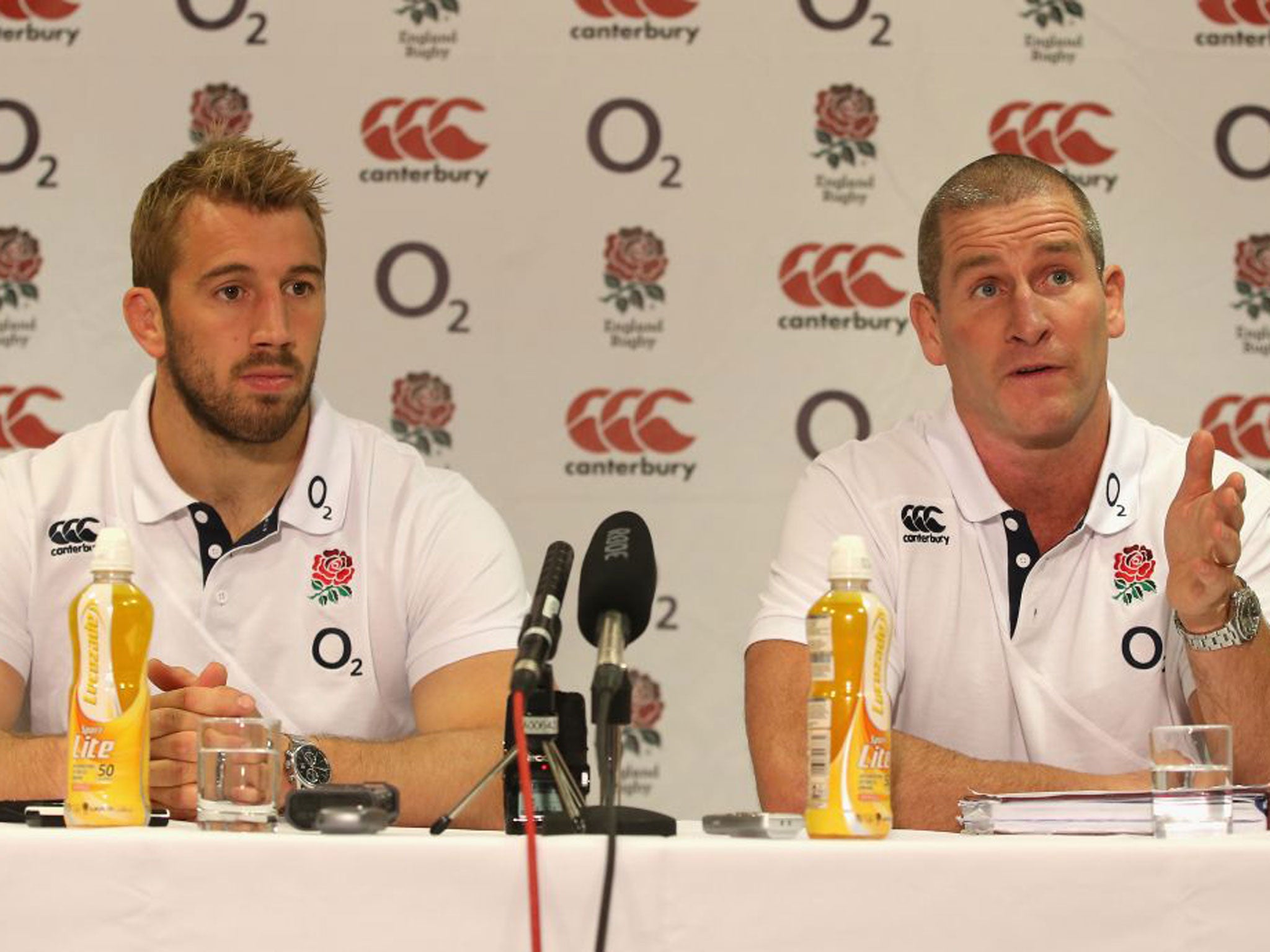 England coach Stuart Lancaster, right, addresses the media yesterday