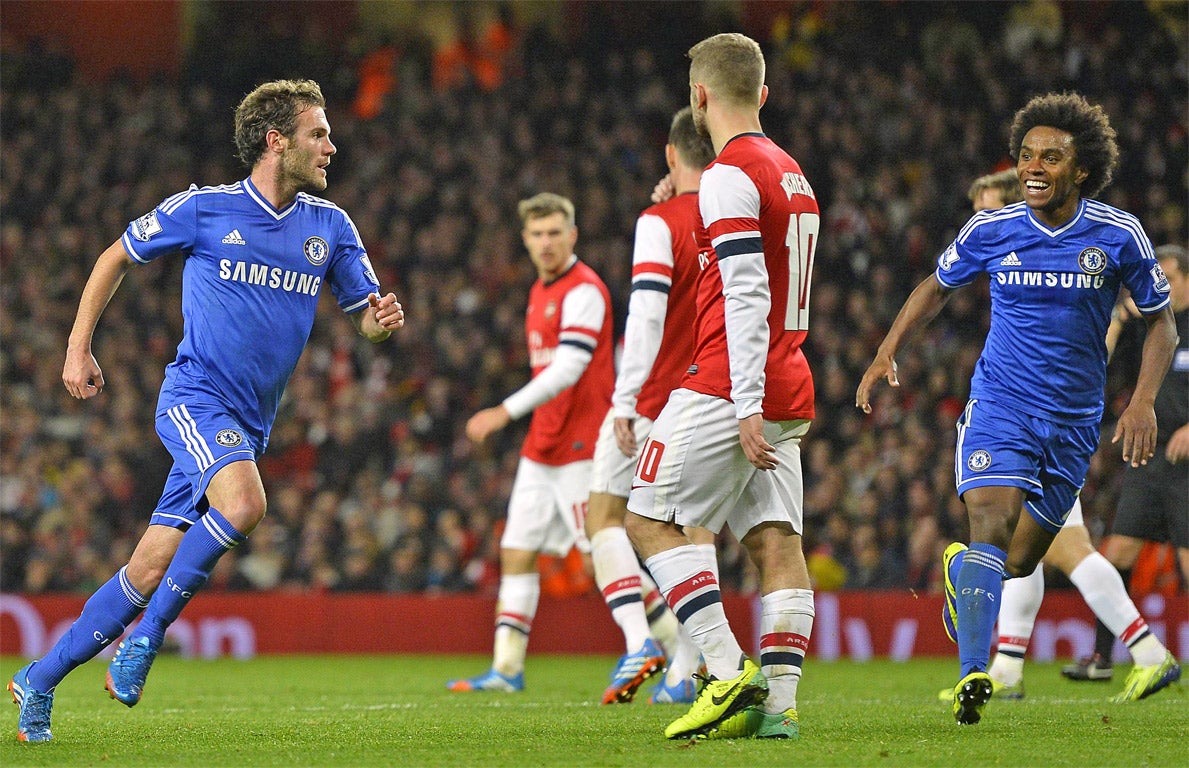 Juan Mata wheels away after scoring Chelsea’s second goal