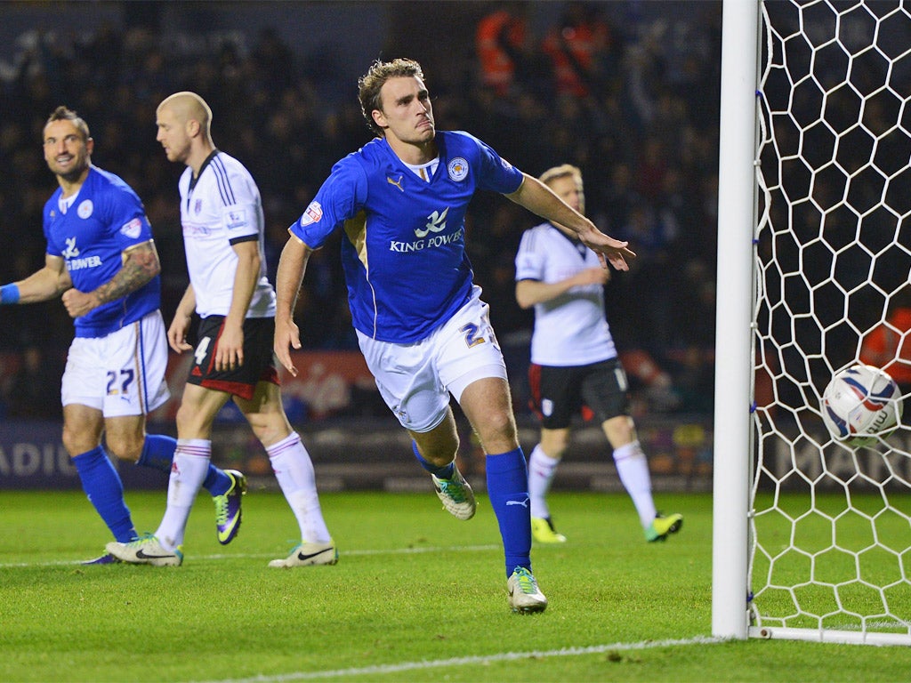 Ignasi Miquel, on loan from Arsenal, celebrates scoring Leicester's third