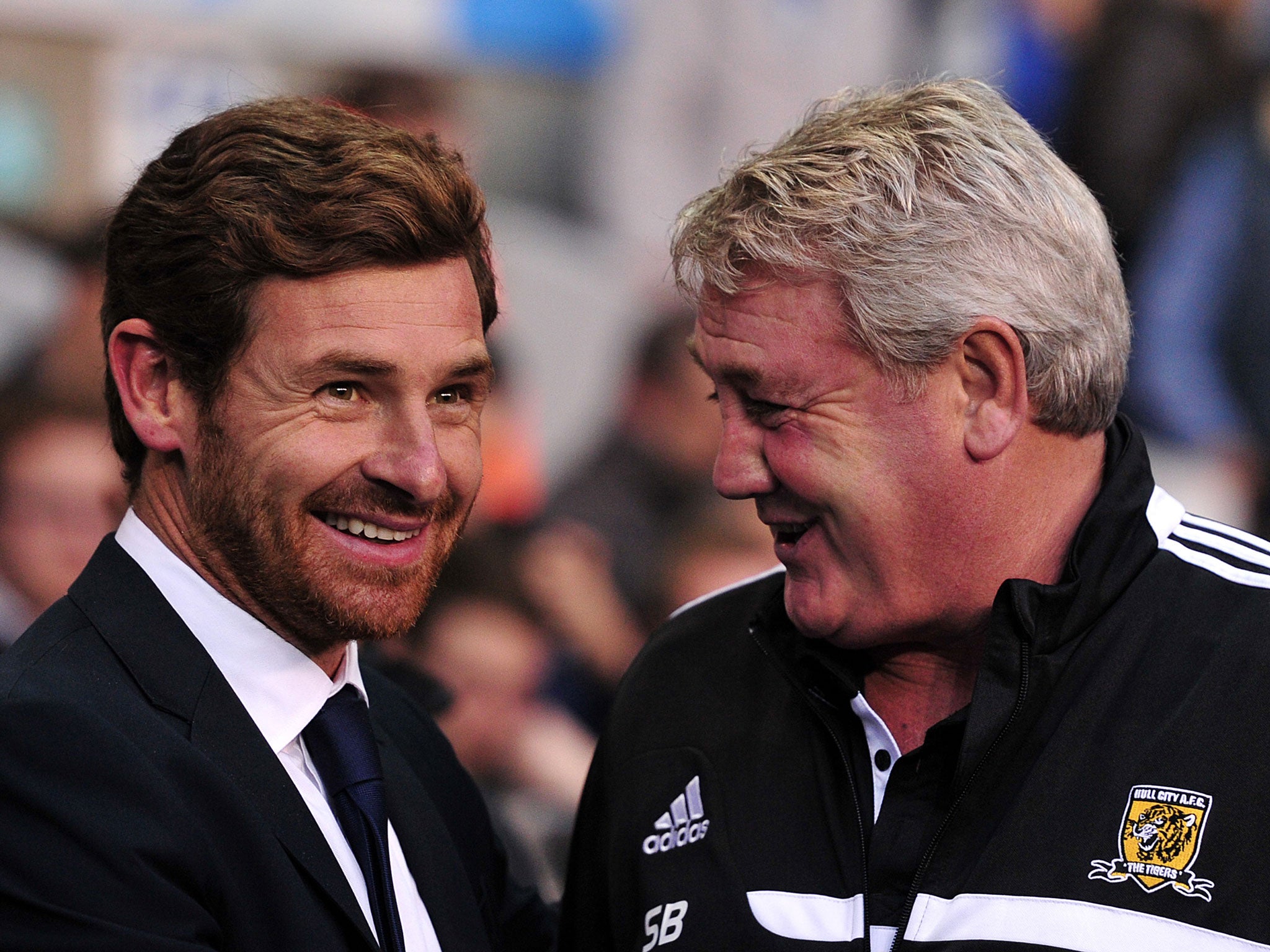 Tottenham Hotspur's Portuguese manager Andre Villas-Boas greets Hull City's English manager Steve Bruce