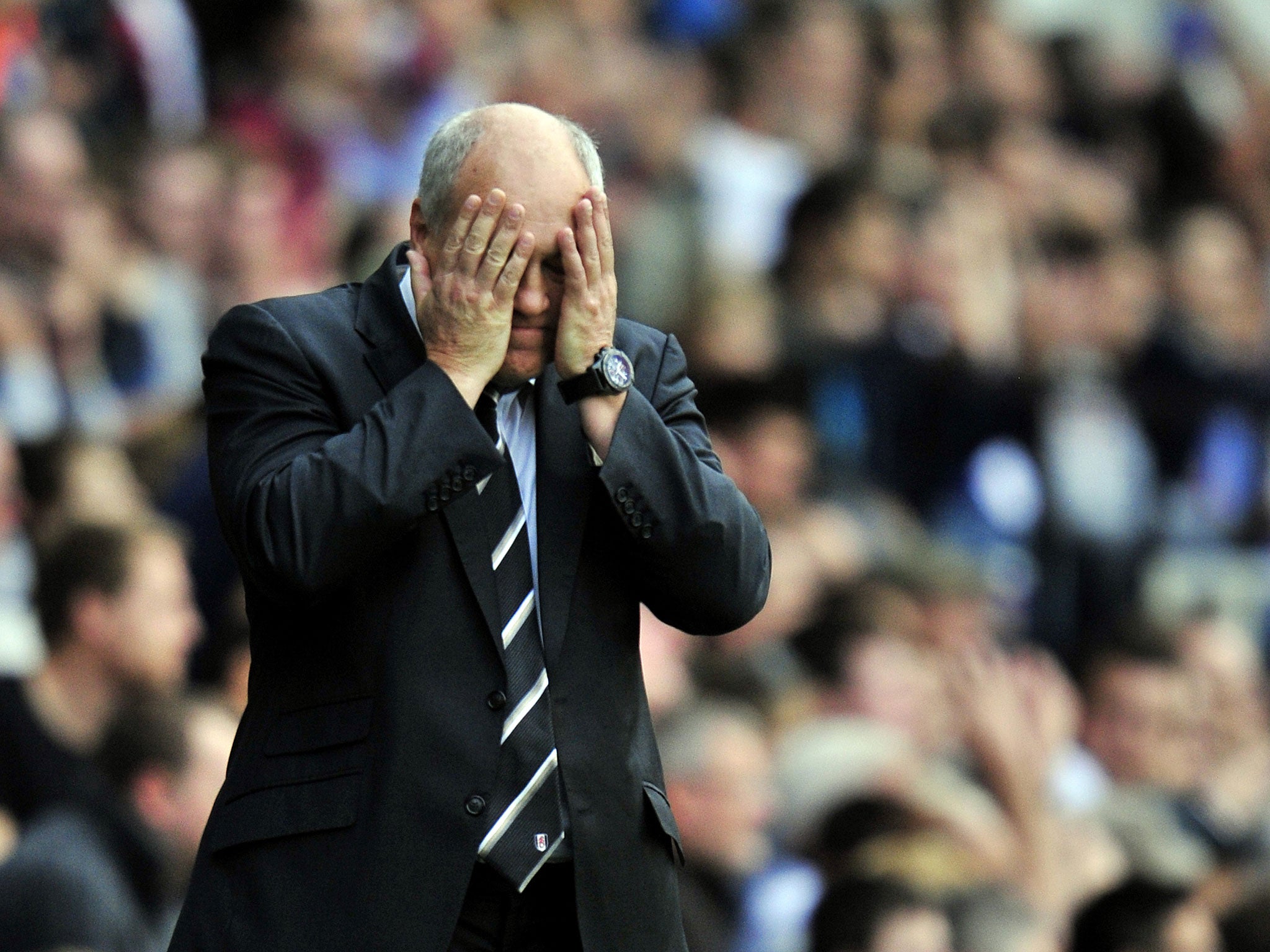 Fulham's Dutch manager Martin Jol reacts during the English Premier League football match between Fulham and Stoke City
