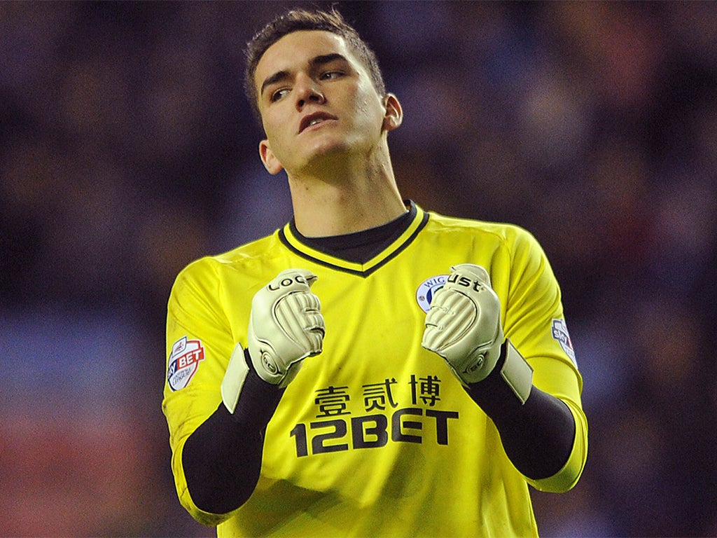 Wigan goalkeeper Lee Nicholls was in inspired form