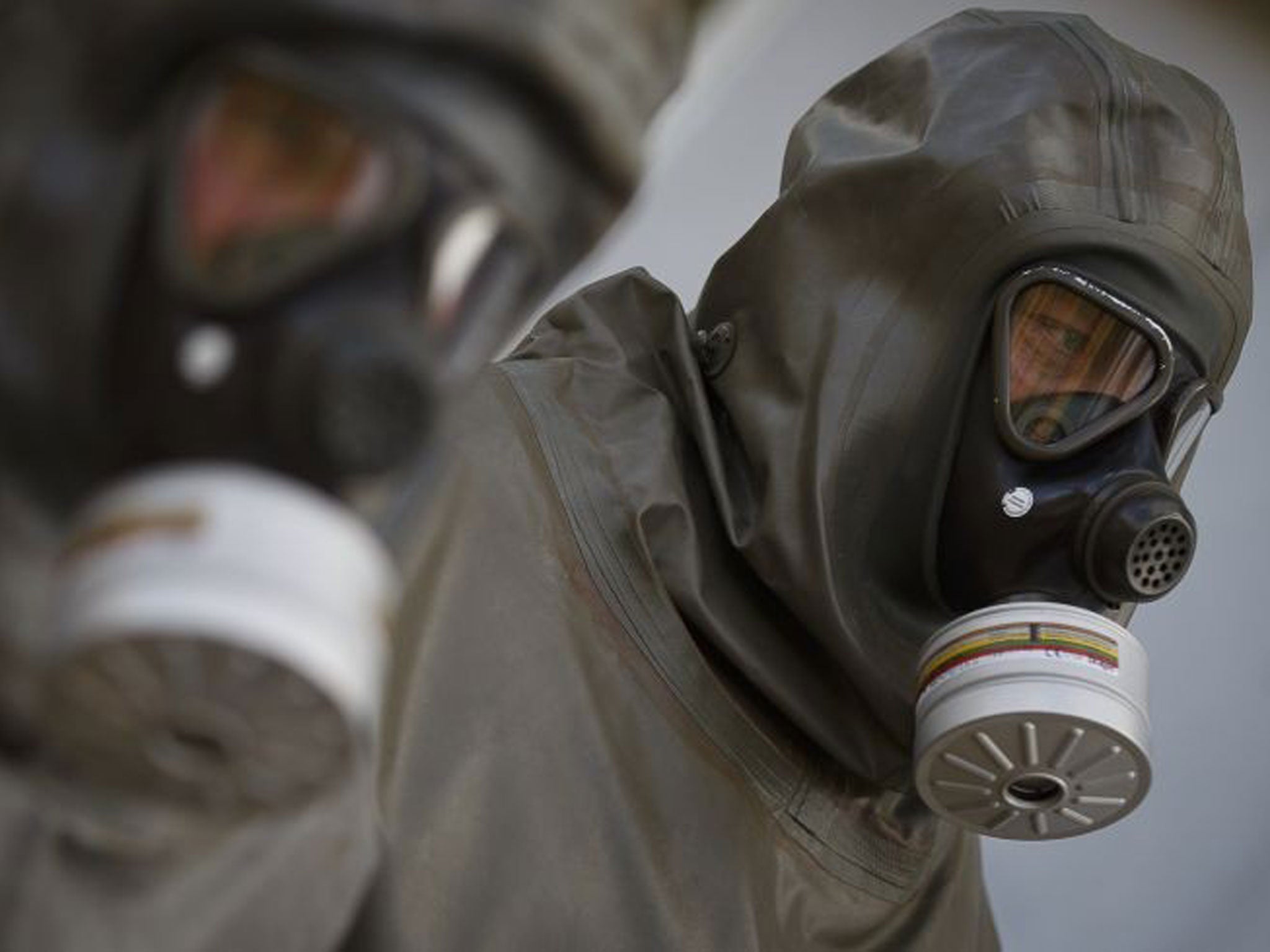 Employees during a demonstration at a reference laboratory for the Organisation for the Prohibition of Chemical Weapons