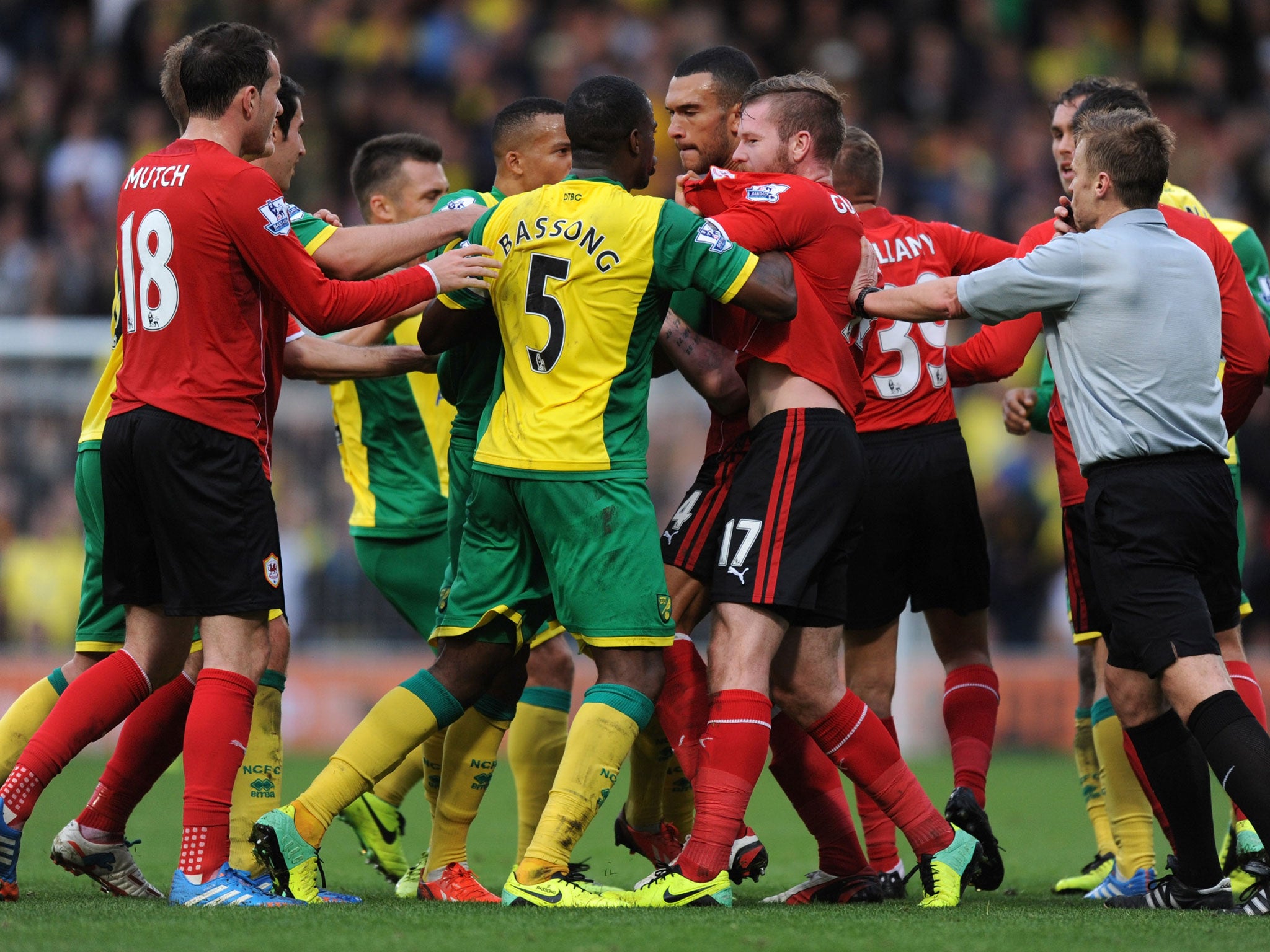 The teams get involved in a tussle during the 0-0 draw last weekend