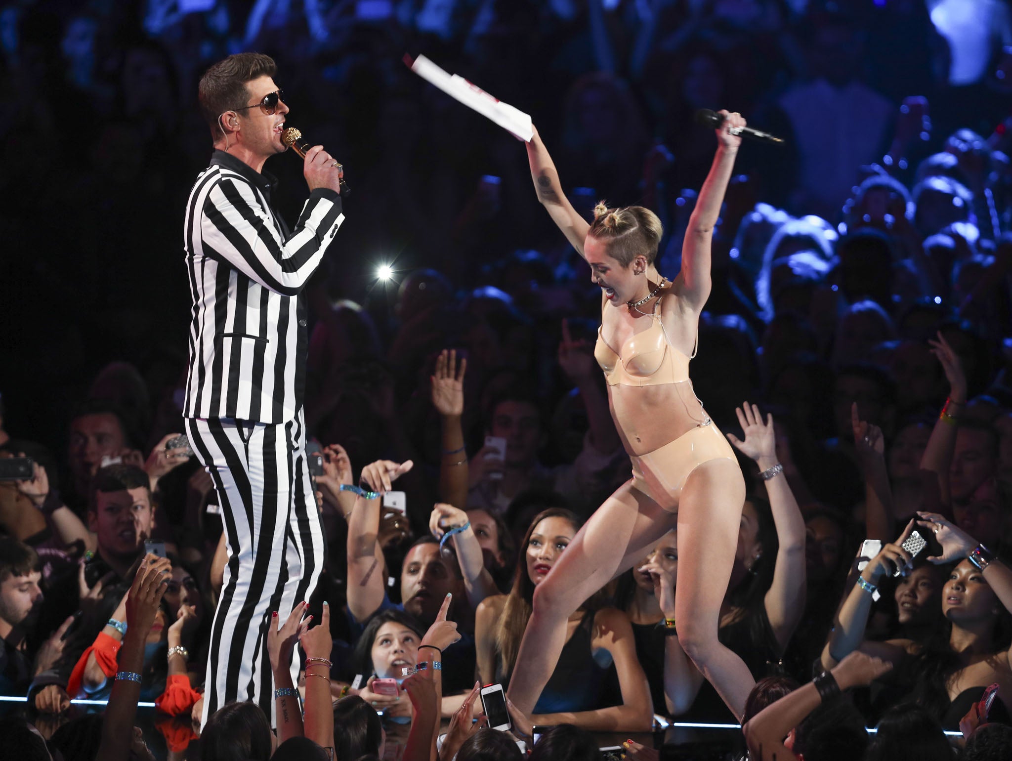 Miley Cyrus or Robin Thicke

<p>Bad replicas of Miley’s snazzy VMA apparel are all over online shopping costume outlets at the moment. But should you venture into the realm of post-Disney princess for Halloween, bear in mind that the sheer fear of rewitnessing Miley-style twerking might send your fellow party-goers in the opposition direction.</p>

<p>Of new contentious costumes for Halloween 2013, dressing up as Robin Thicke comes in at no.1. Famous for that song with questionable lyrics, gyrating against Miley Cyrus, and not much else, people might start to wonder why you decided to impersonate the man.</p>