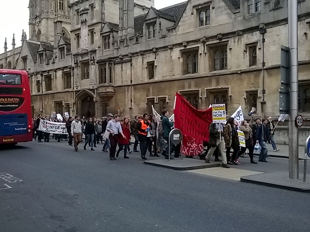 Strikers in Oxford march down the High Street