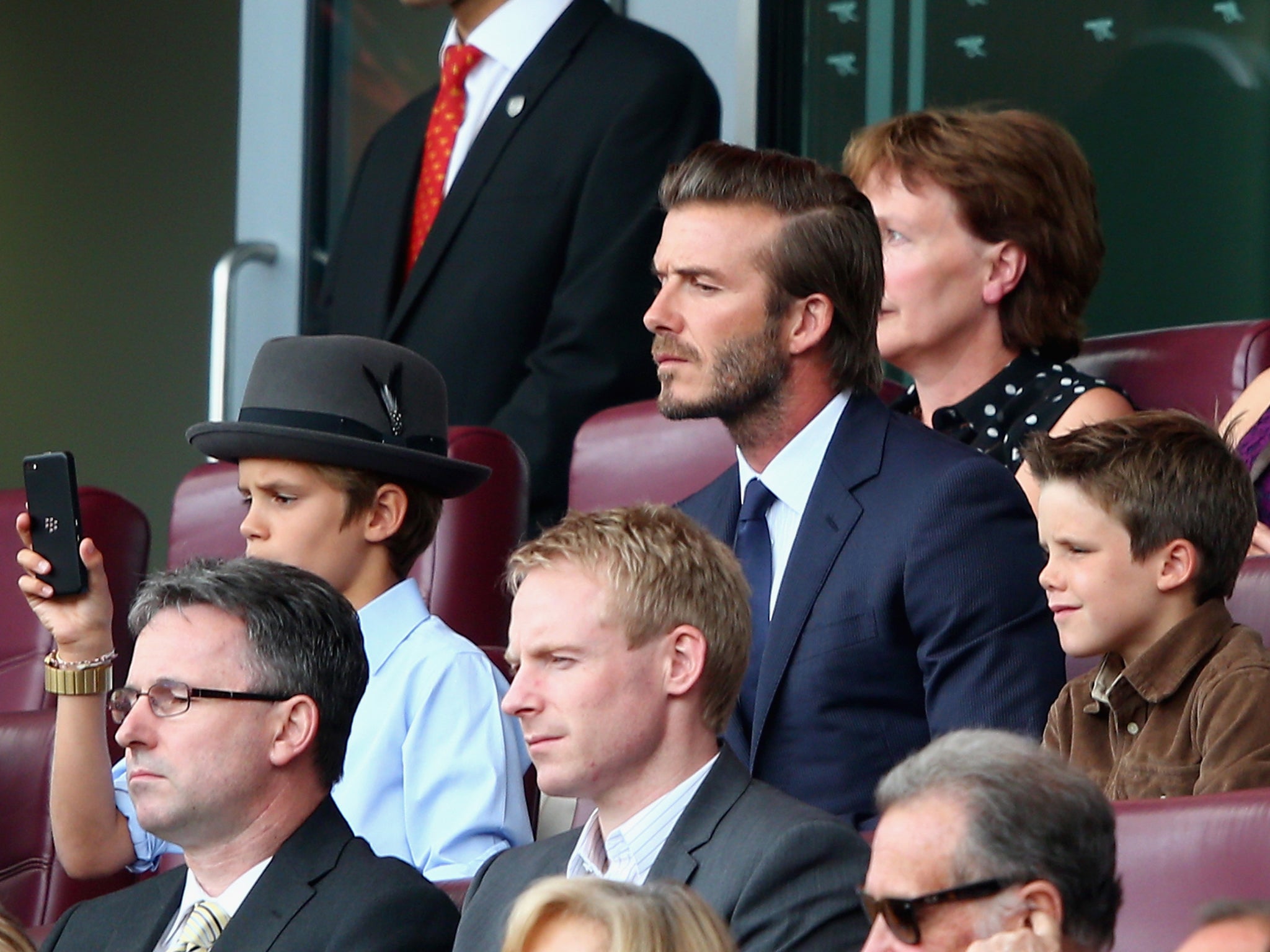 David took his son's Romeo (L) and Cruz (R) to the Emirates to watch Arsenal earlier this season after Romeo has been training with their academy