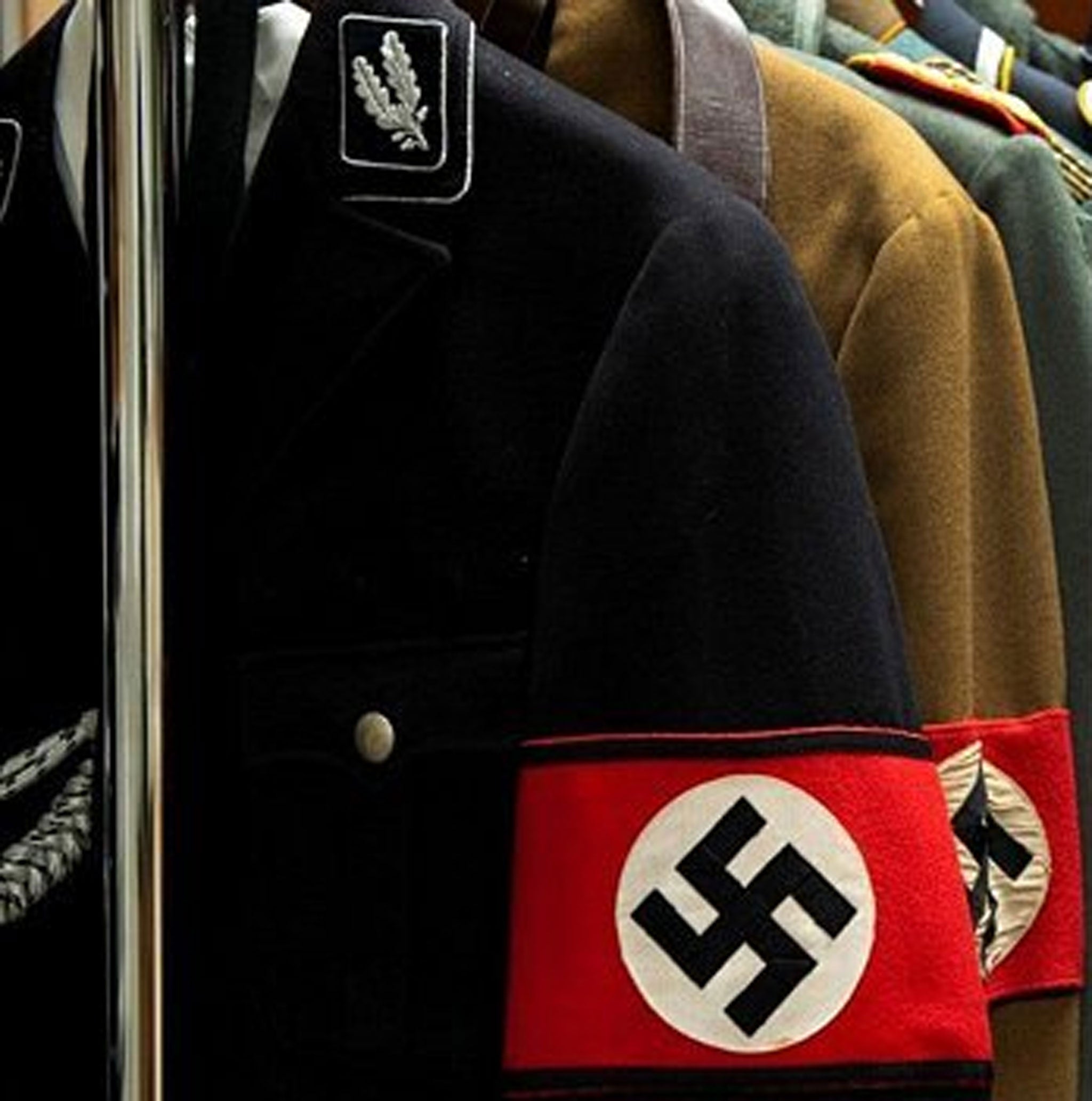 Police have been called to a branch of Asda after a man was seen wandering the aisles wearing a full Nazi SS uniform.