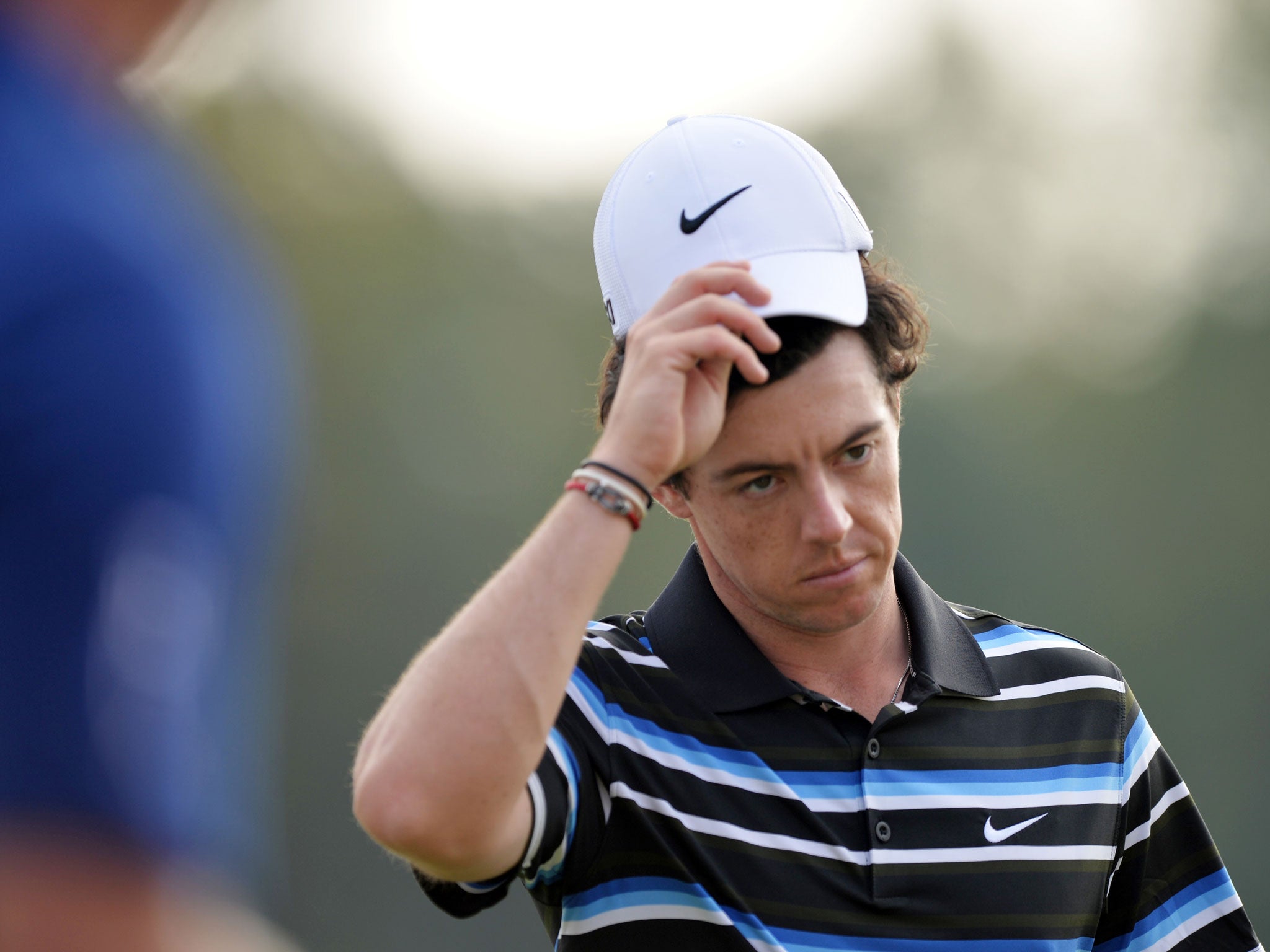 SHANGHAI, CHINA - NOVEMBER 01: Rory McIlroy of Northern Ireland finishes his second round after ending with a bogey at the 18th hole during day two of the WGC-HSBC Champions tournament at the Shanghai Sheshan International Golf Club