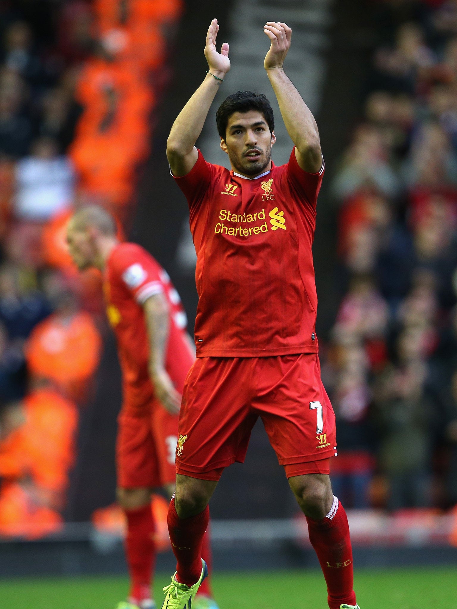 Arsène Wenger had three bids for Luis Suarez rejected