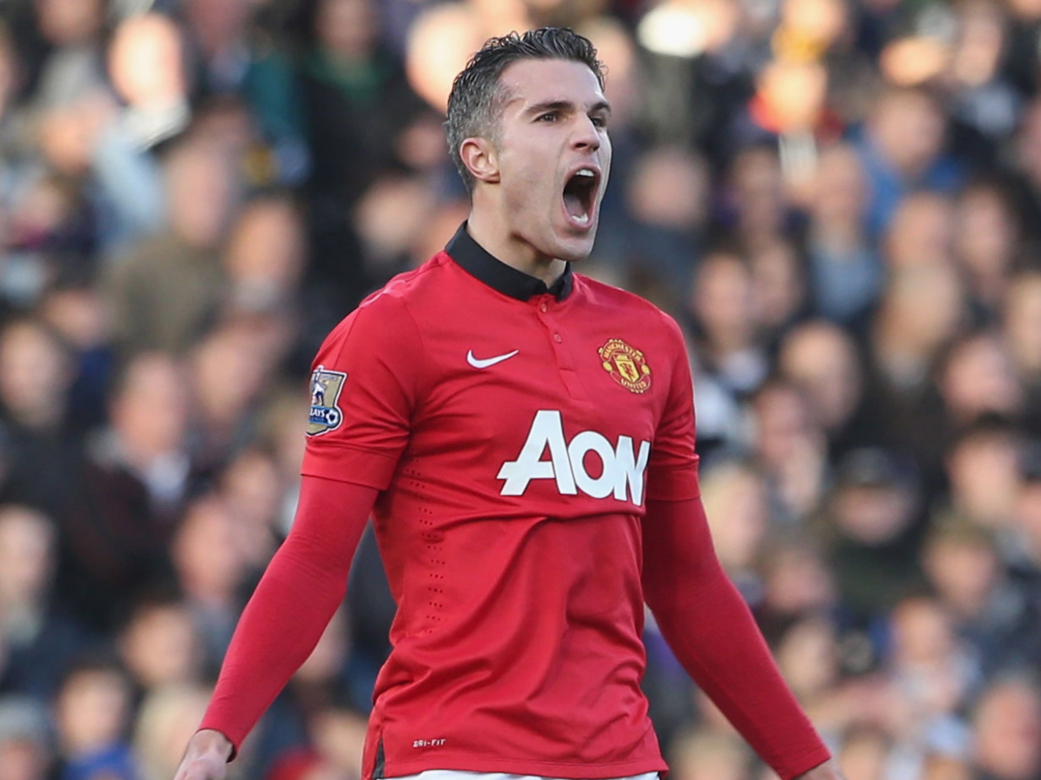 Robin van Persie celebrates after scoring for Manchester United