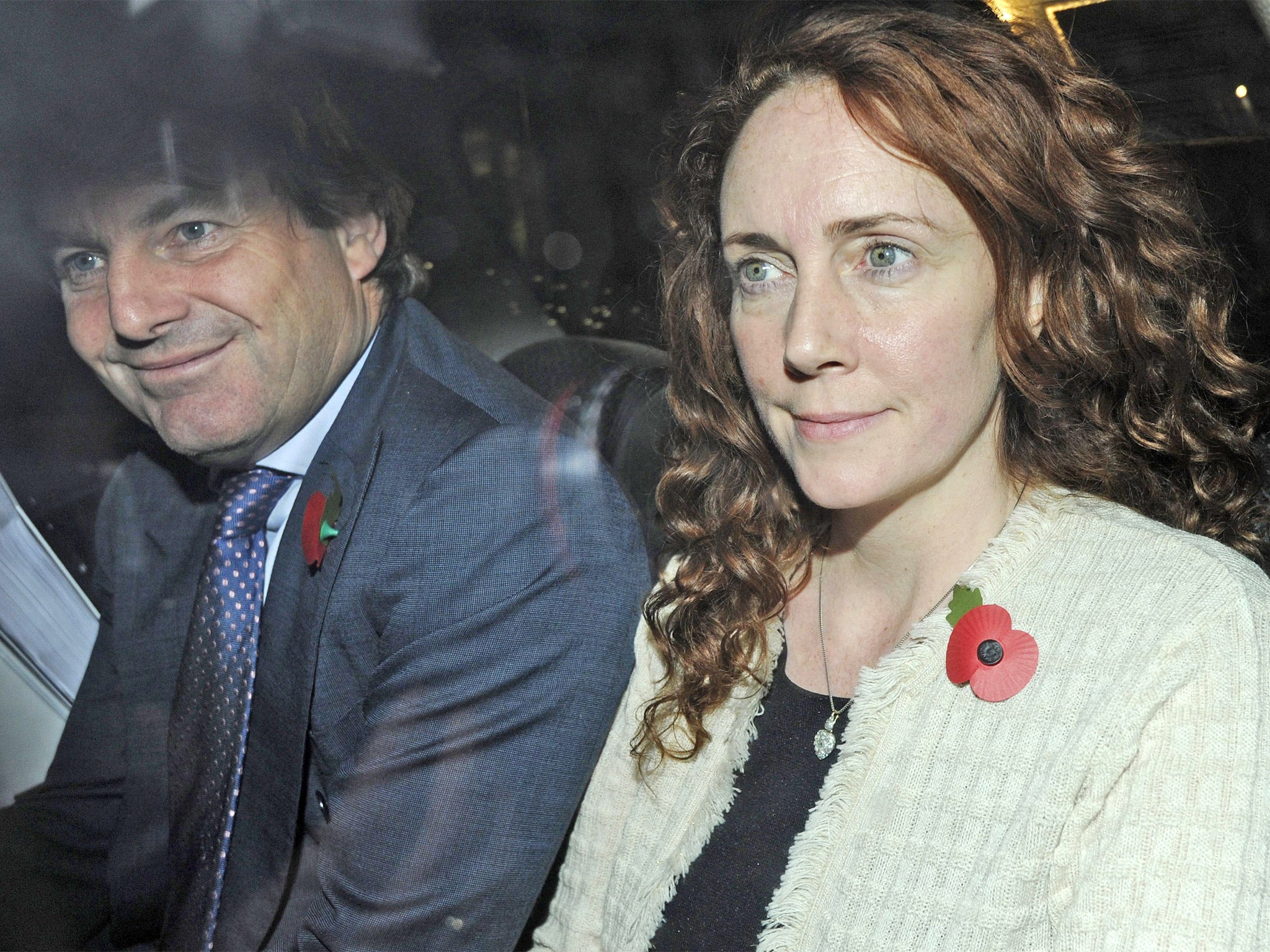 Former Chief Executive of News International, Rebekah Brooks and her husband Charlie leave the Old Bailey