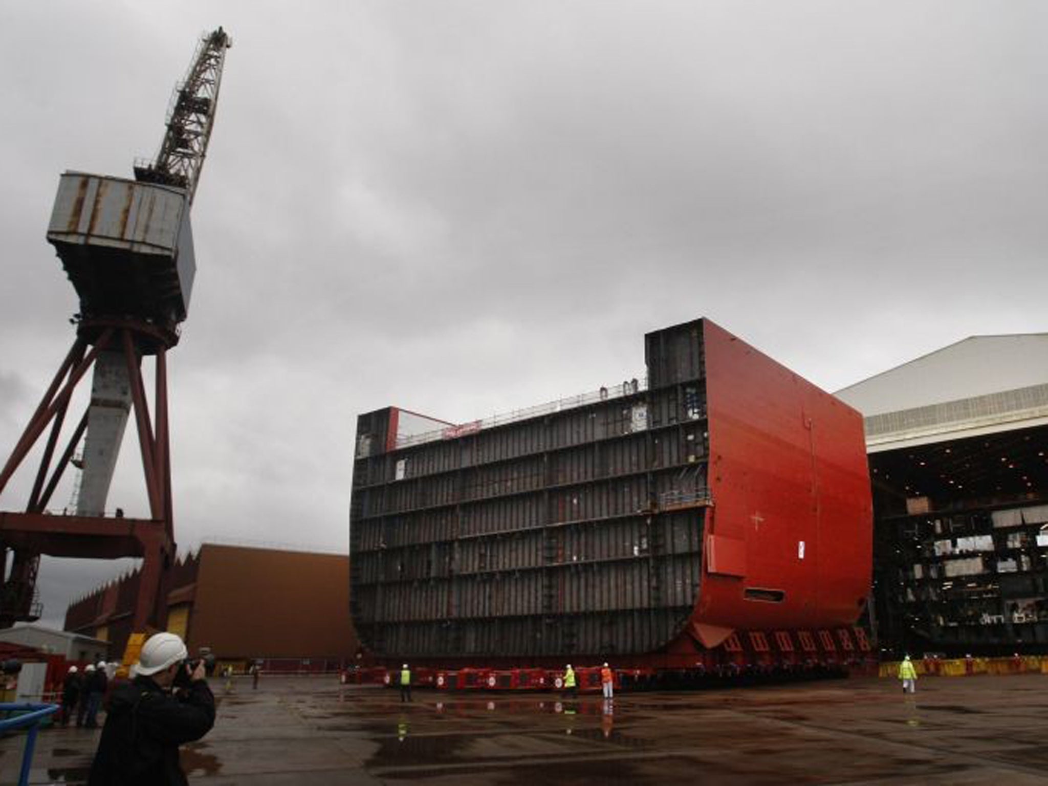 A section of the hull of HMS Queen Elizabeth being moved at BAE Systems' Govan Shipyard in Glasgow, Scotland, where jobs are under threat