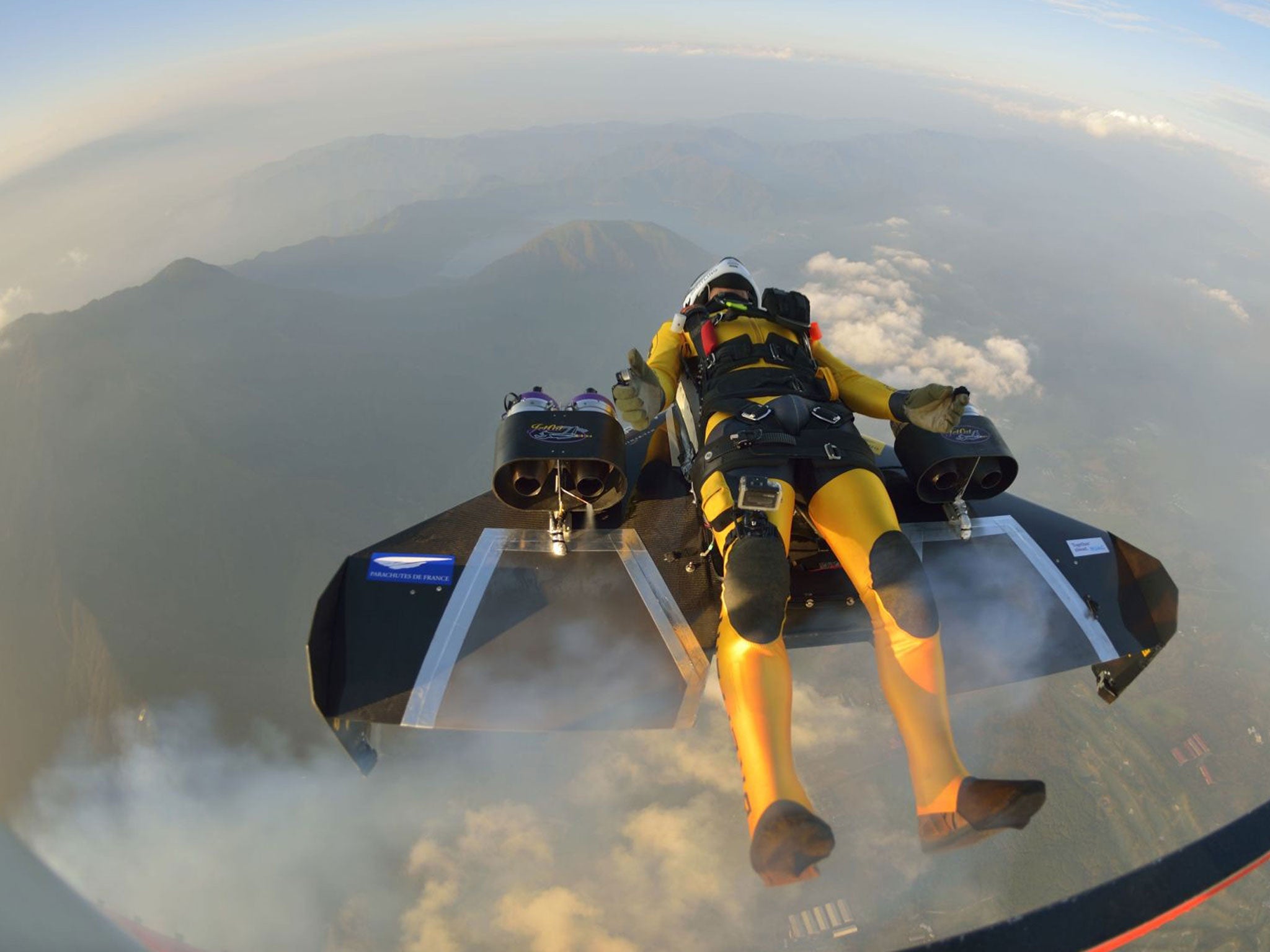 Yves Rossy jumps from a helicopter at an altitude of 3,600 meters (11,811 feet) and successfully flew the jet-powered carbon-Kevlar Jetwing near Mount Fuji