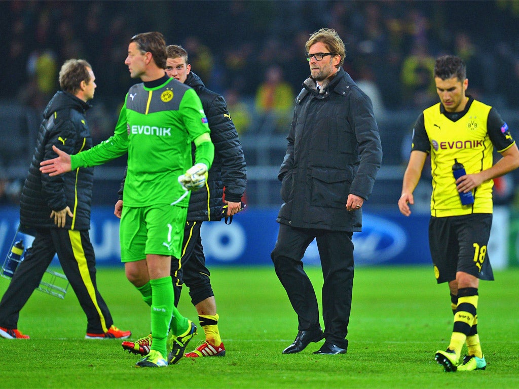 Jurgen Klopp and his players can't believe the outcome (Getty)