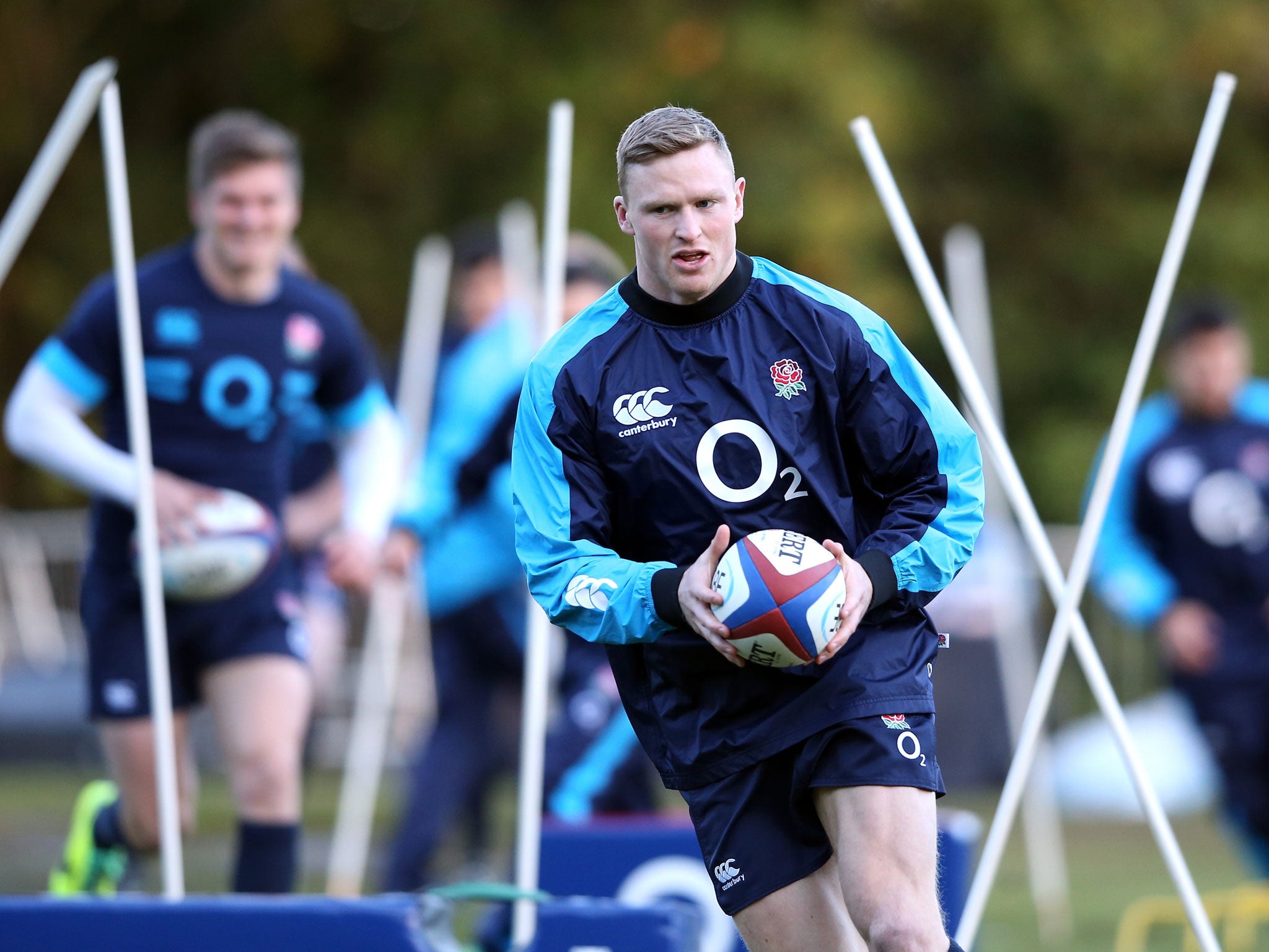 Chris Ashton runs though the slalom poles during training