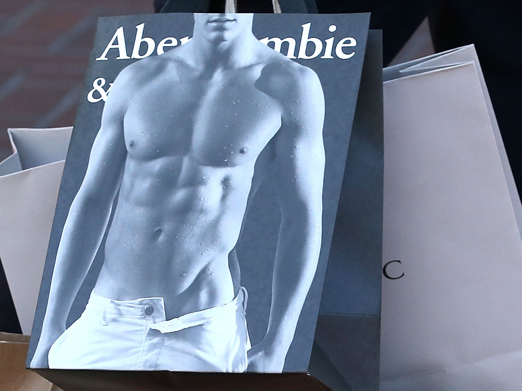 Abercrombie &amp; Fitch bags feature topless young models