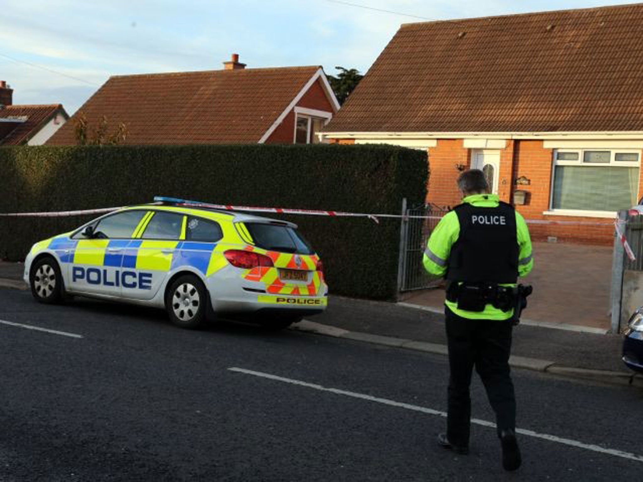 Police in the street where the bomb was planted